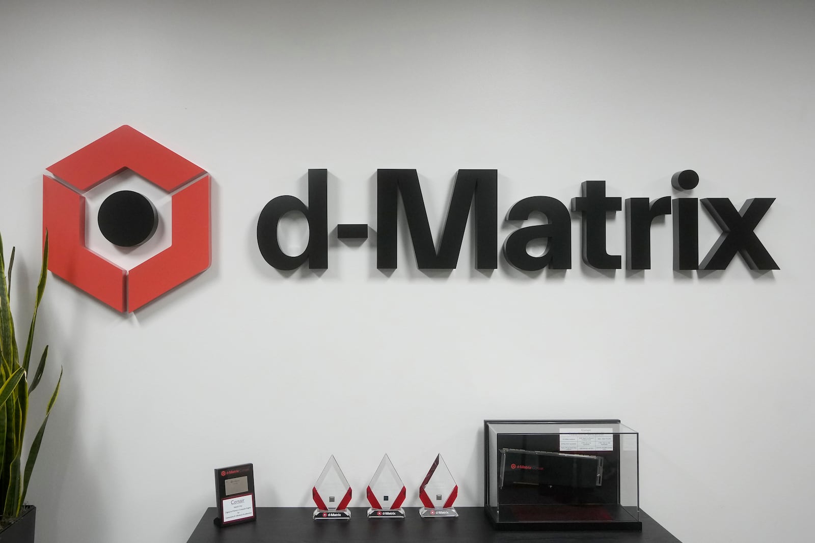 A d-Matrix sign is displayed at the company's office in Santa Clara, Calif., Wednesday, Oct. 16, 2024. (AP Photo/Jeff Chiu)