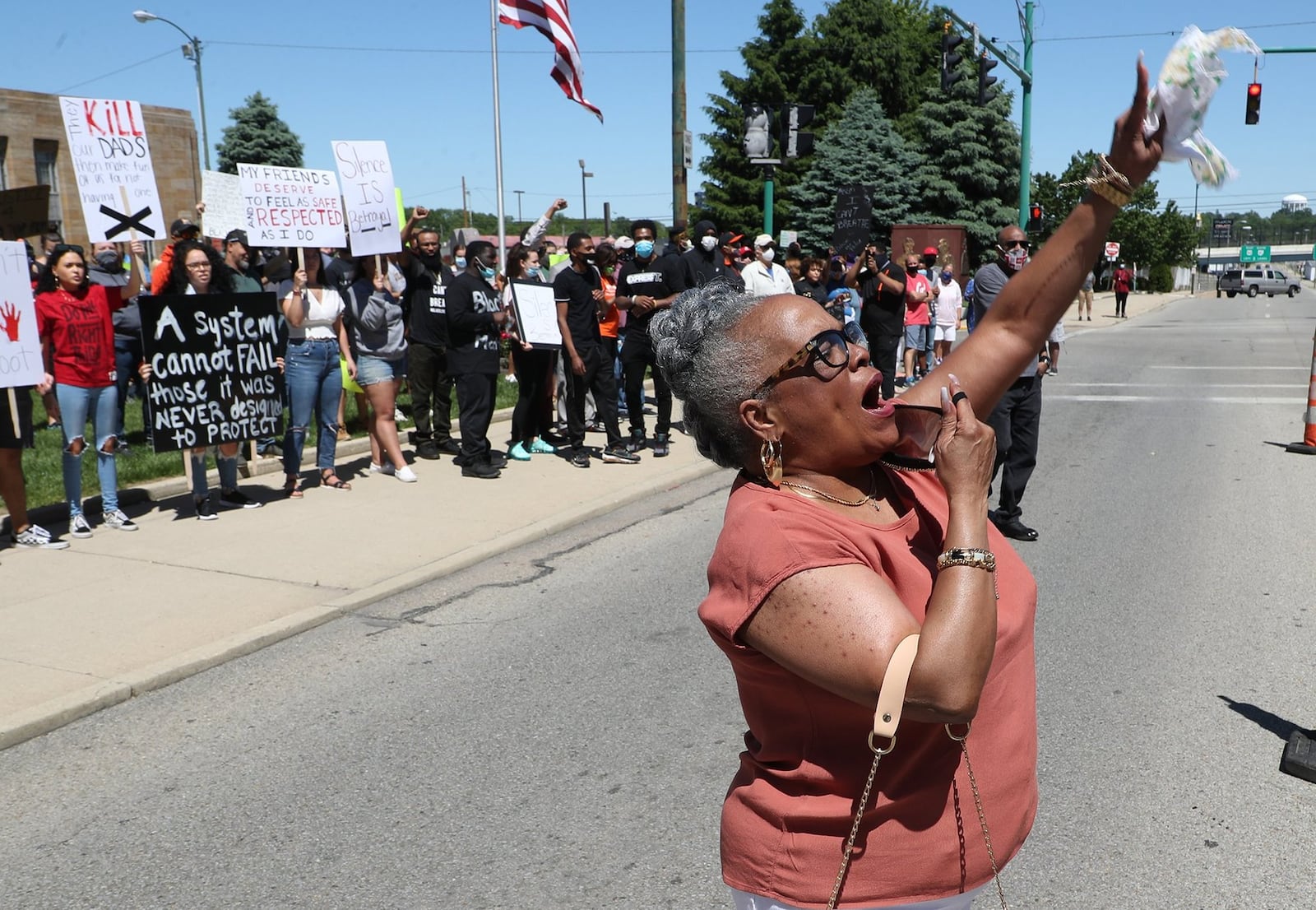 Denise Williams, president of the Springfield NAACP, leads the protesters in a chant during a demonstration last summer against racial injustice in the country. BILL LACKEY/STAFF