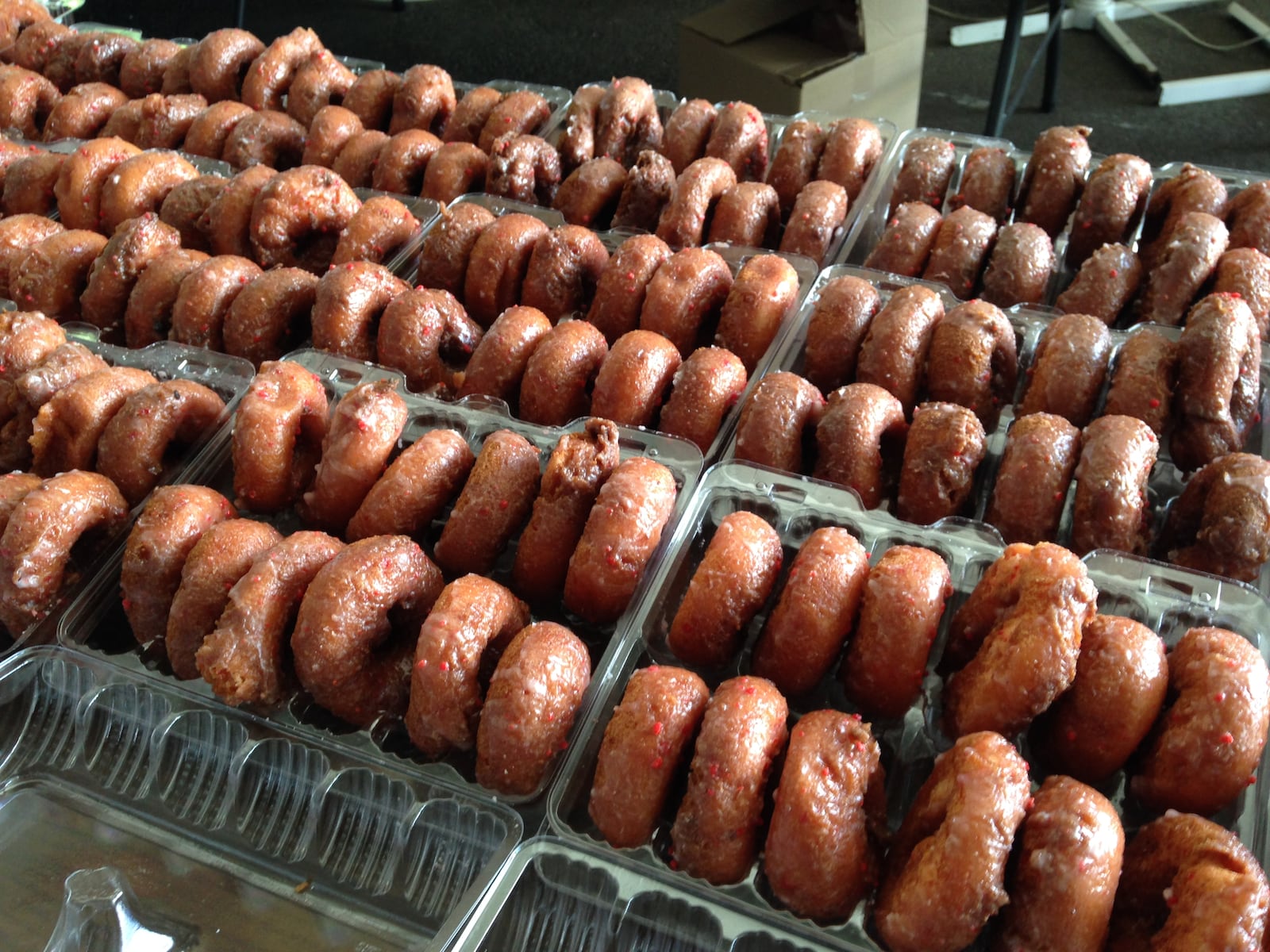 The famous strawberry donuts fund-raiser at the Troy Strawberry Festival helps benefit Troy schools music programs. (Amelia Robinson/Staff)