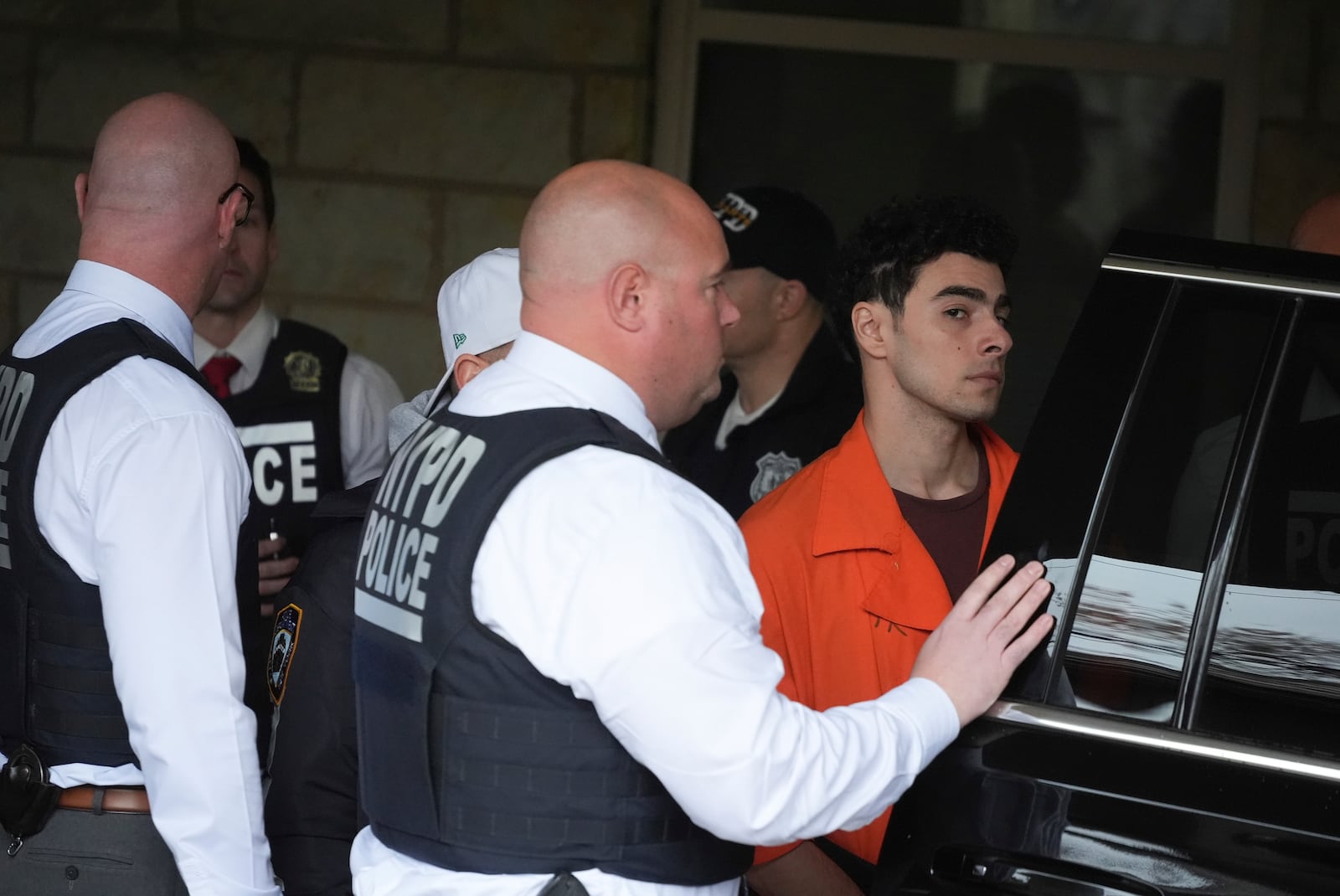 Luigi Nicholas Mangione leaves at Blair County Courthouse in Hollidaysburg, Pa., Thursday, Dec. 19, 2024. (AP Photo/Gene J. Puskar, Pool)