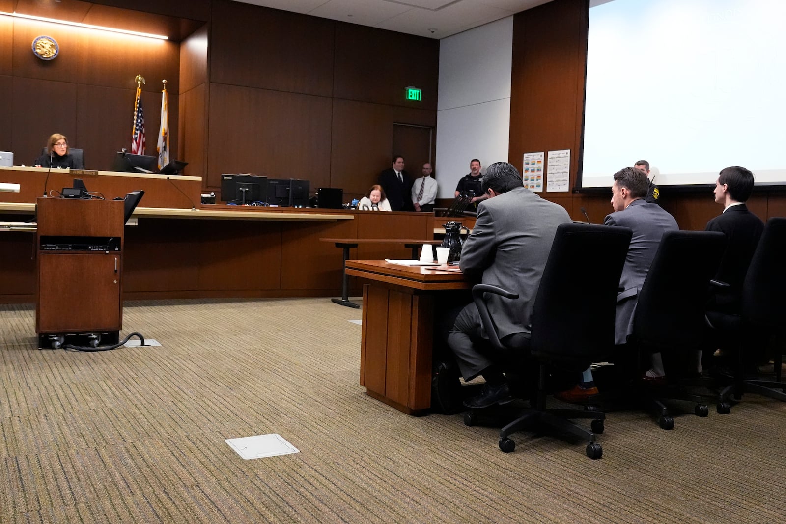 Robert E. Crimo III., right, listens to Judge Victoria A. Rossetti's questions, left, during his trial at the Lake County Courthouse in Waukegan, Ill., Monday, March 3, 2025. (AP Photo/Nam Y. Huh, Pool)