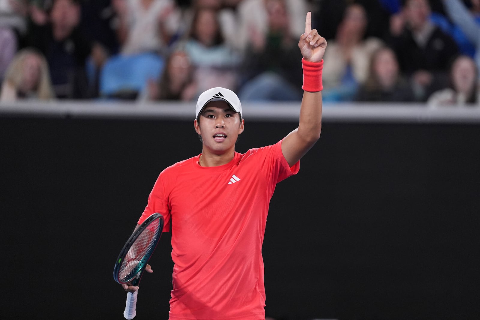 Learner Tien of the U.S. gestures during his second round match against Daniil Medvedev of Russia at the Australian Open tennis championship in Melbourne, Australia, Thursday, Jan. 16, 2025. (AP Photo/Ng Han Guan)