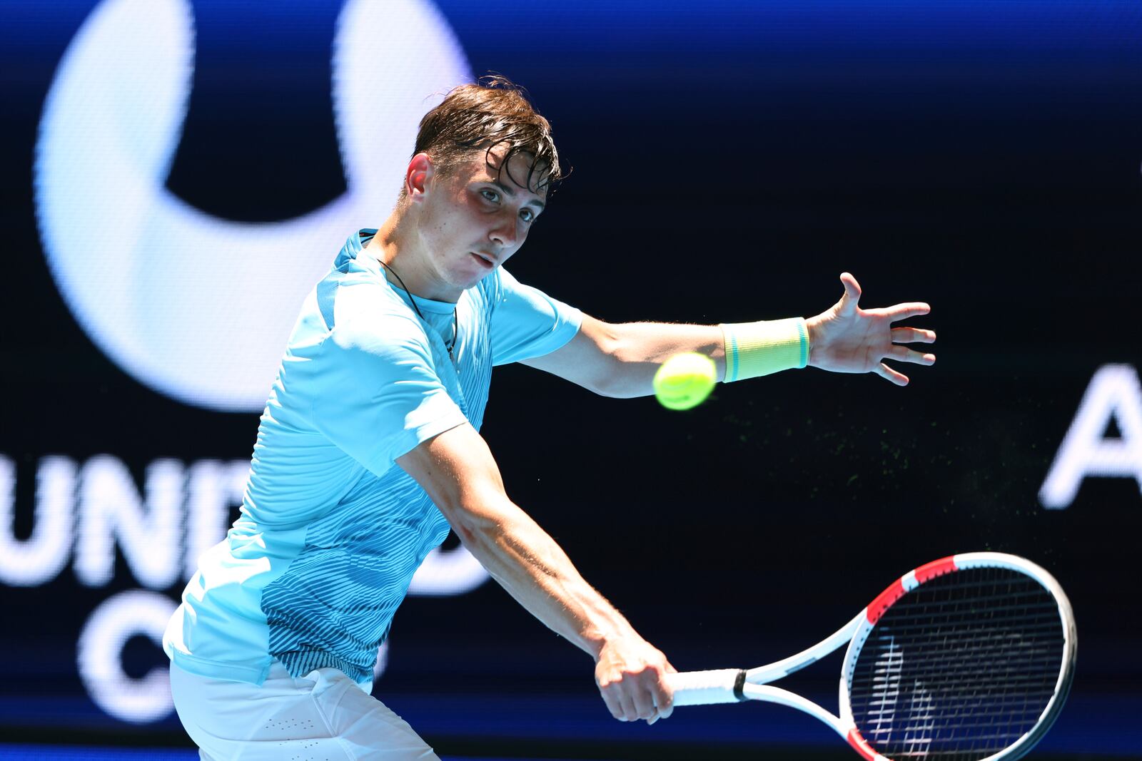 Alexander Shevchenko of Kazakhstan hits a return shot to Daniel Masur of Germany during their United Cup tennis match in Perth, Australia, Wednesday, Jan. 1, 2025. (AP Photo/Trevor Collens)