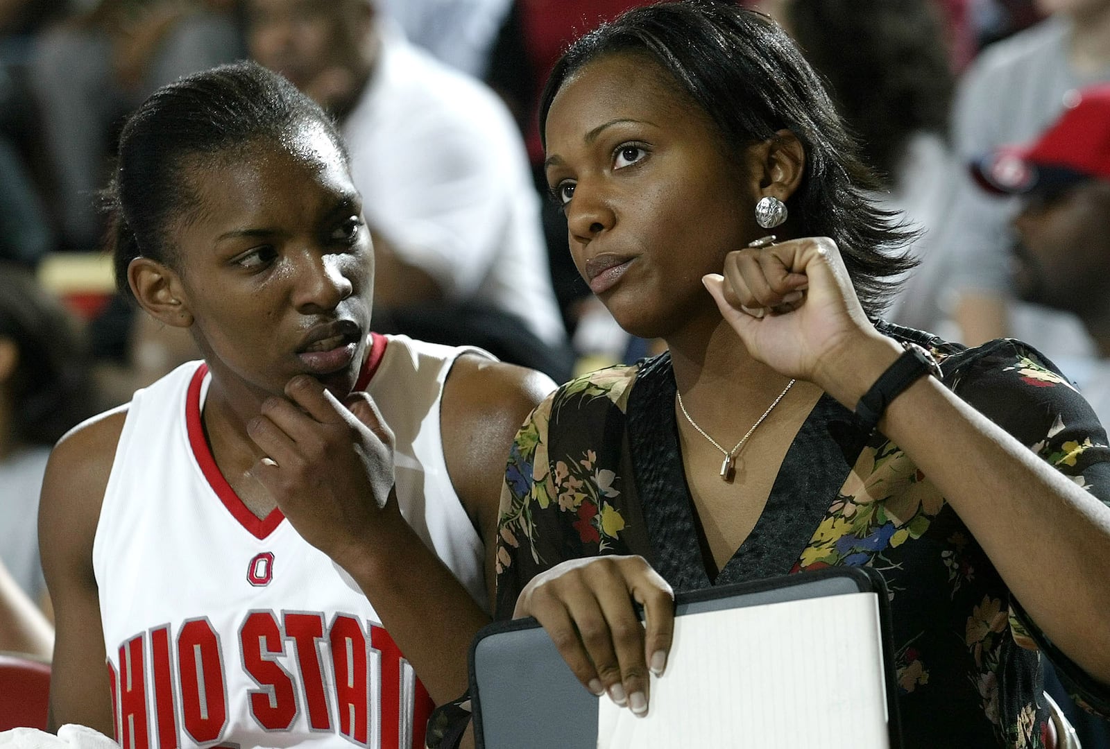 SPECIAL TO THE DAYTON DAILY NEWS - Ohio State women's basketball assistant coach Tamika Williams, right, gives advice to Tamara Riley during their game against Yale Saturday Nov. 27, 2004 in Columbus, Ohio. (AP Photo/Jay LaPrete)