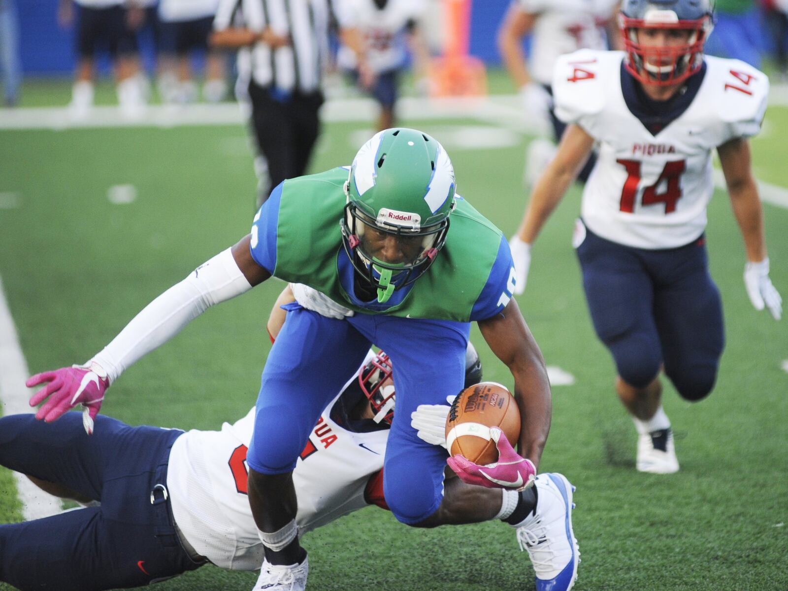 CJ receiver Dominic Wilcox makes a short gain. CJ defeated visiting Piqua 42-22 in a Week 1 high school football game on Friday, Aug. 24, 2018. MARC PENDLETON / STAFF