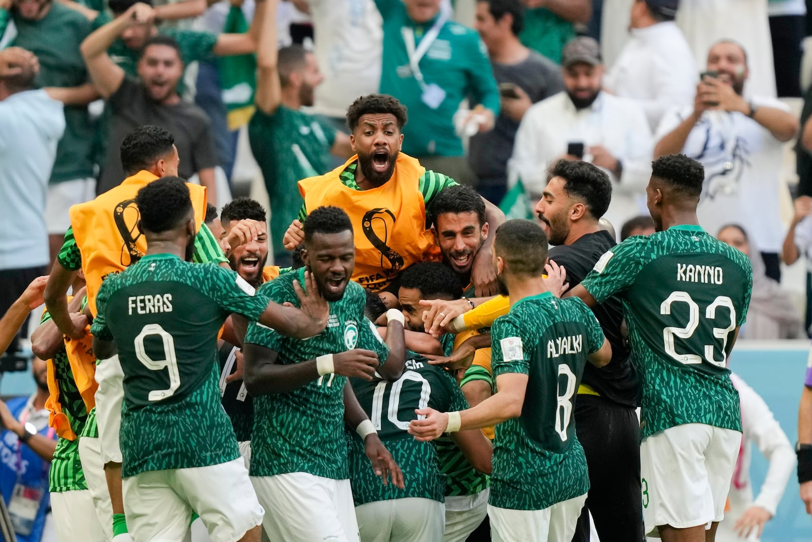 FILE - Saudi Arabia's Salem Al-Dawsari is congratulated after scoring his side's second goal during a World Cup Group C soccer match between Argentina and Saudi Arabia at the Lusail Stadium in Lusail, Qatar, Tuesday, Nov. 22, 2022. (AP Photo/Jorge Saenz, File)