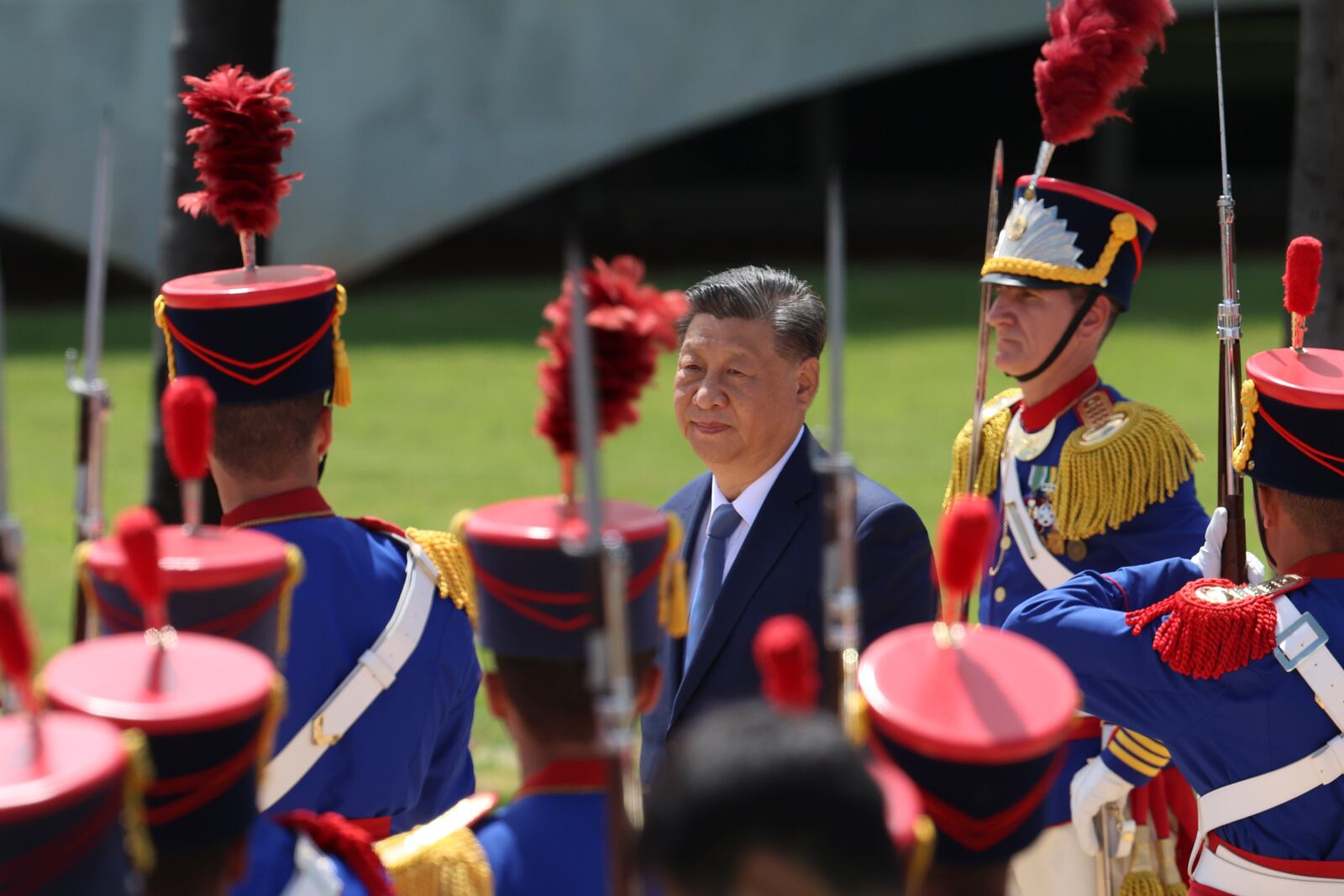 China's President Xi Jinping walks past an honor guard during a welcoming ceremony at the Alvorada palace in Brasilia, Brazil, Wednesday, Nov. 20, 2024. (AP Photo/Luis Nova)