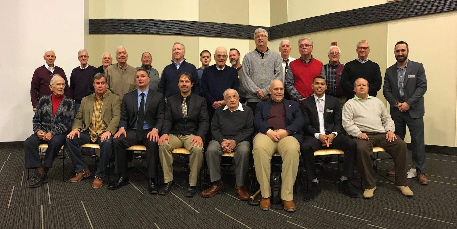 Members of the Springfield/Clark County Baseball Hall of Fame, including Don Rinker (front row, fifth from left) pose for a photo after the induction ceremony on Saturday, Jan. 6, 2018, at the Hollenbeck Bayley Conference Center in Springfield. David Jablonski/Staff