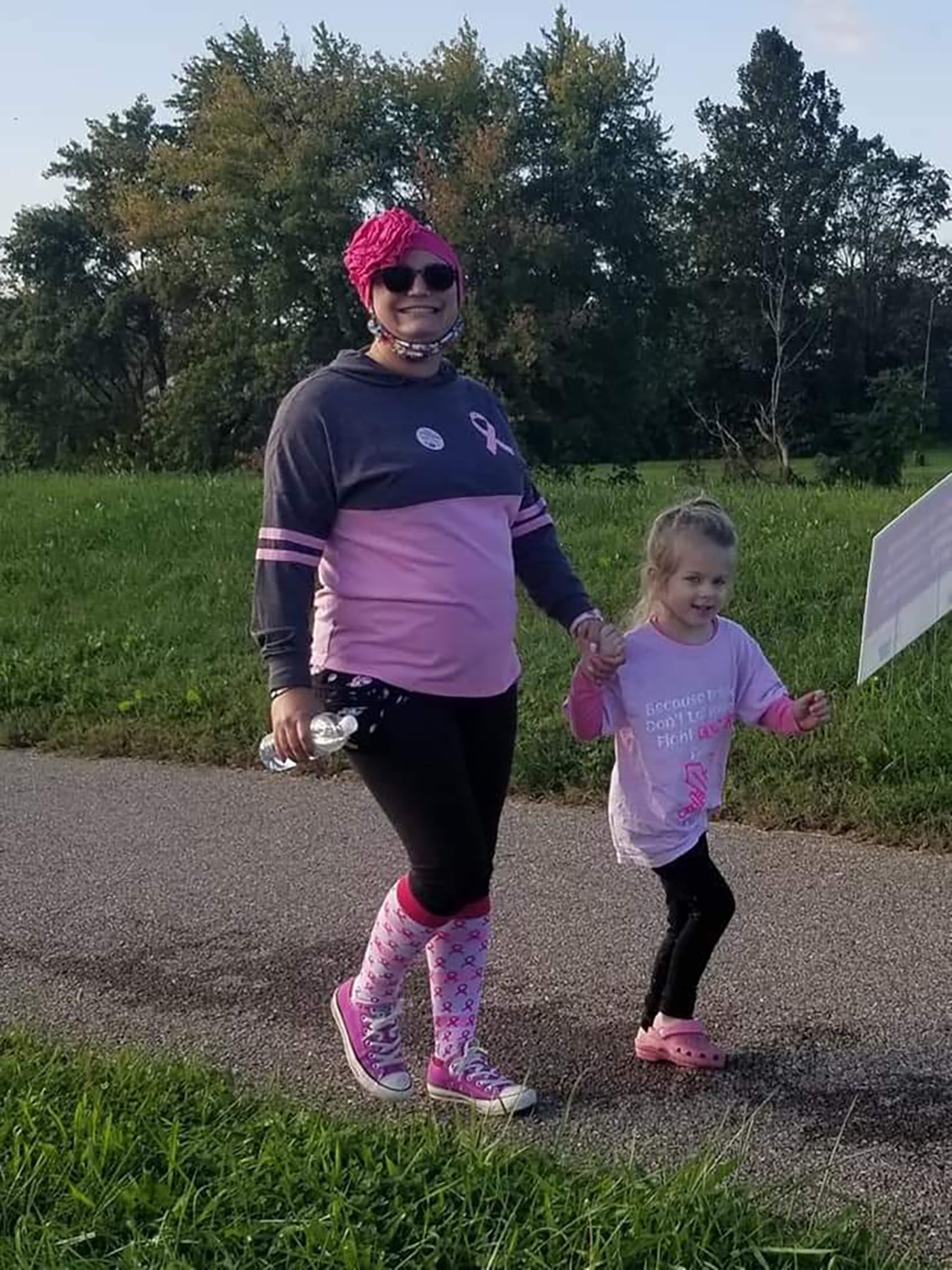 Carrie Graf walking with her niece, Eva, at the 2021 Making Strides Greater Dayton 5K Walk. CONTRIBUTED