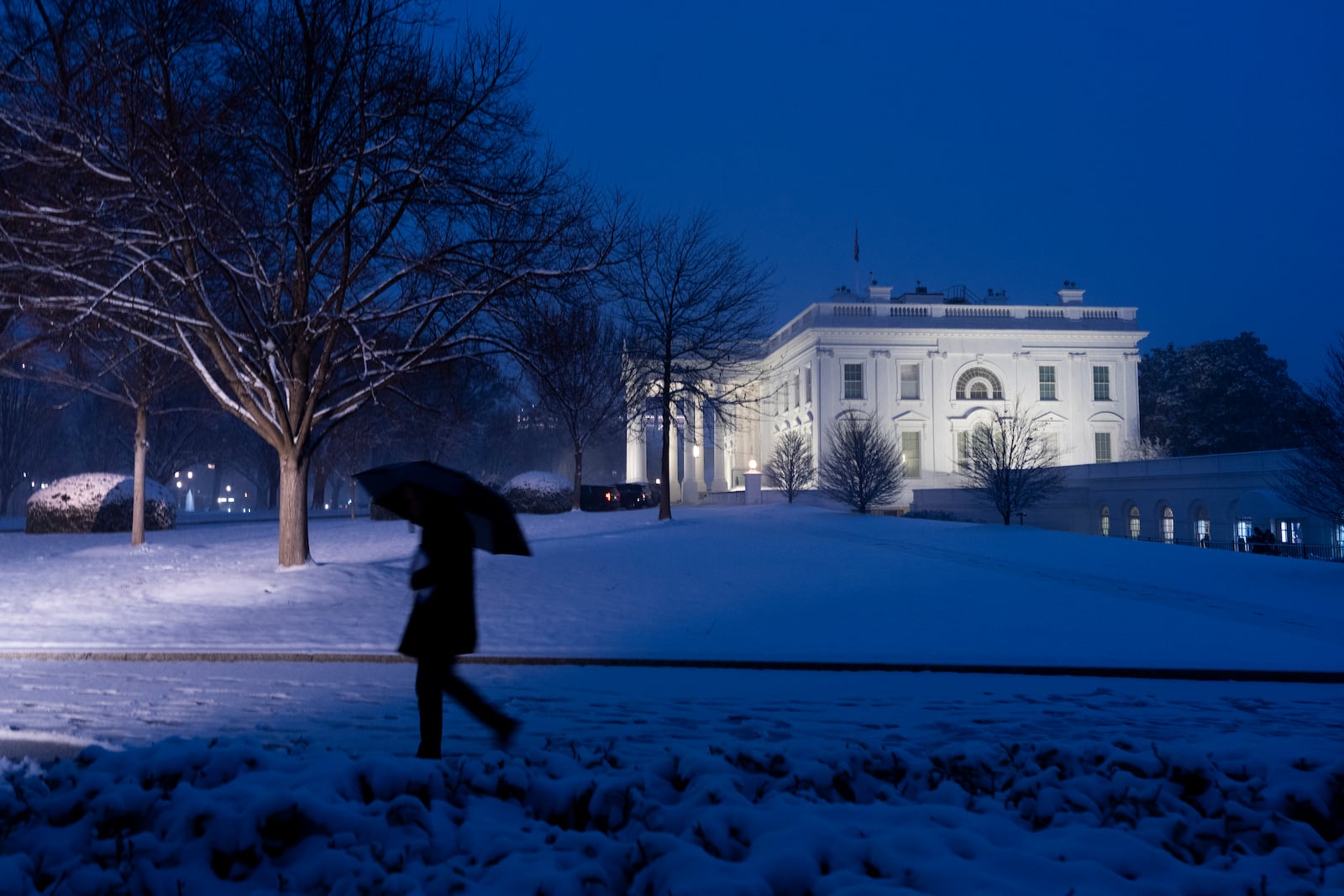 The White House is seen as the snow falls, Tuesday, Feb. 11, 2025, in Washington. (Photo/Alex Brandon)