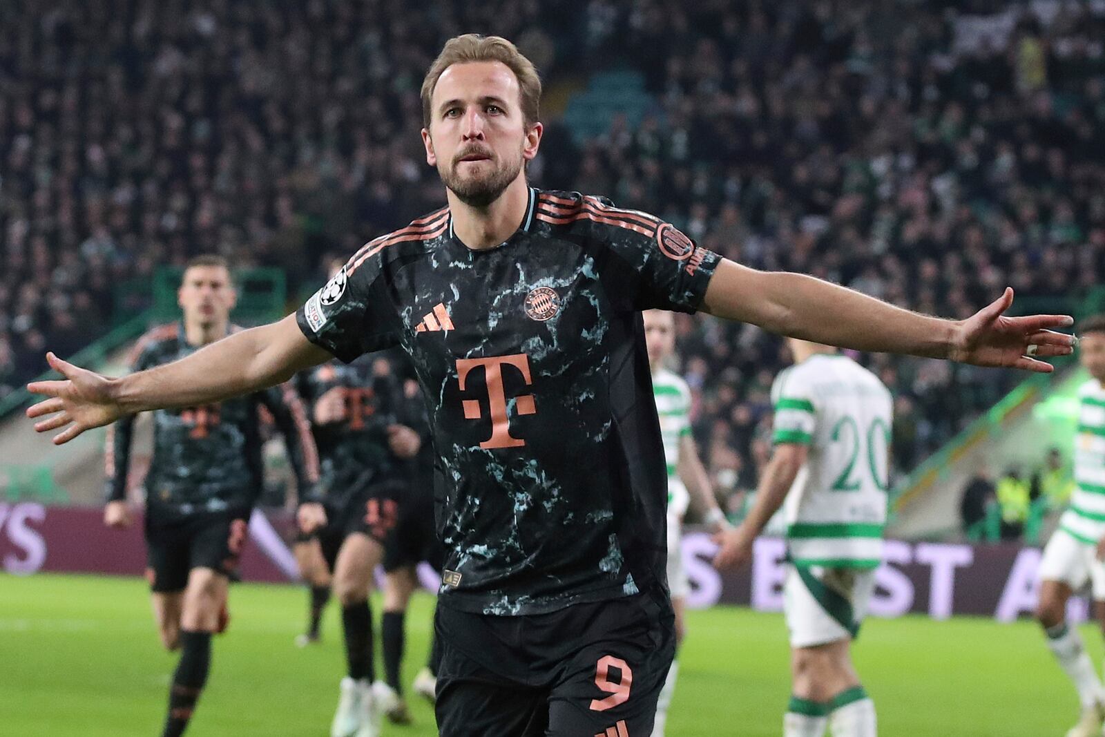 Bayern's Harry Kane celebrates after scoring his side's second goal during the Champions League play off first leg soccer match between Celtic Glasgow and Bayern Munich at the Celtic Park Stadium in Glasgow, Scotland, Wednesday, Feb. 12, 2025. (AP Photo/Scott Heppell)