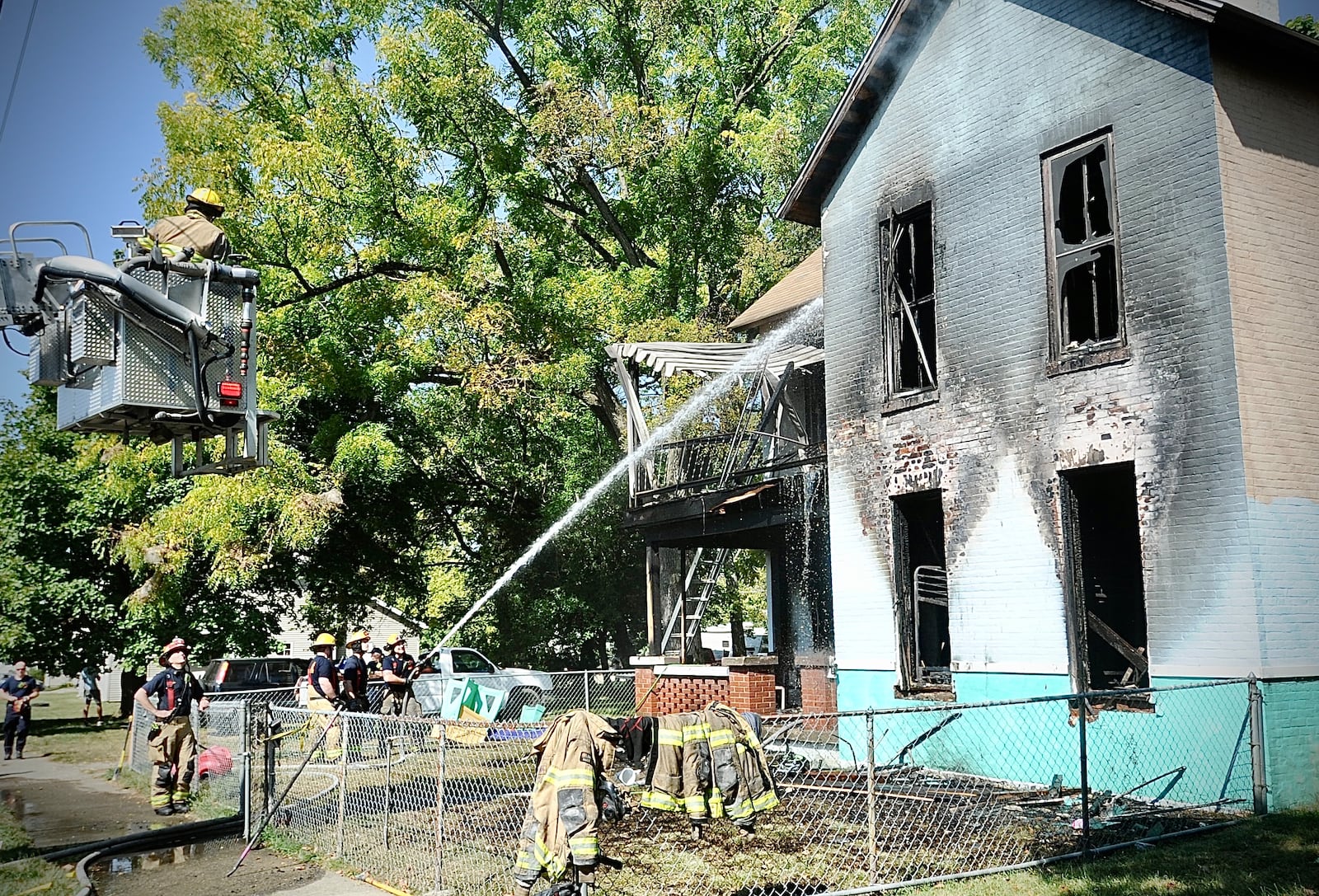 Members of the Springfield Fire Division battled a house fire on Pleasant Street Friday September 22, 2023. MARSHALL GORBY \STAFF