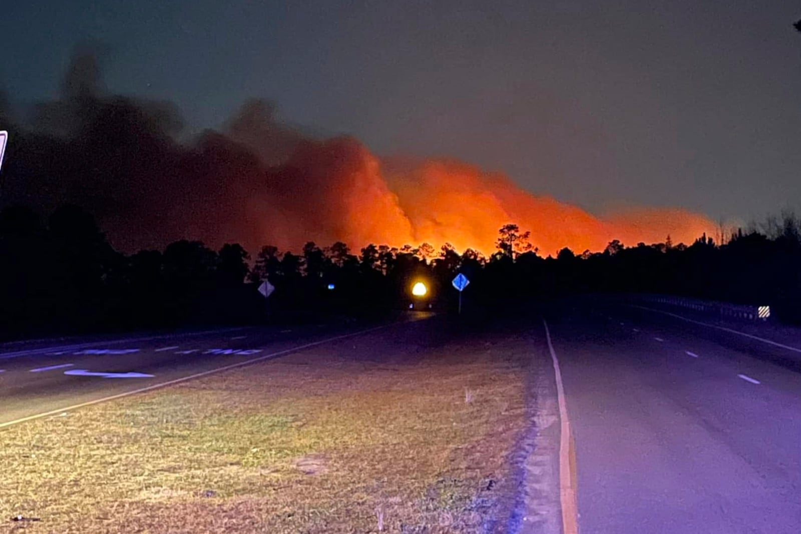 In this photo released by the Horry County Fire Rescue, smoke is seen from fires in Horry County, S.C., on Saturday, March 1, 2025. (Horry County Fire Rescue via AP)