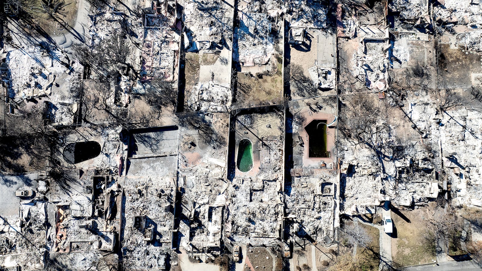 Residences destroyed by the Eaton Fire line a neighborhood in Altadena, Calif., on Tuesday, Jan. 21, 2025. (AP Photo/Noah Berger)