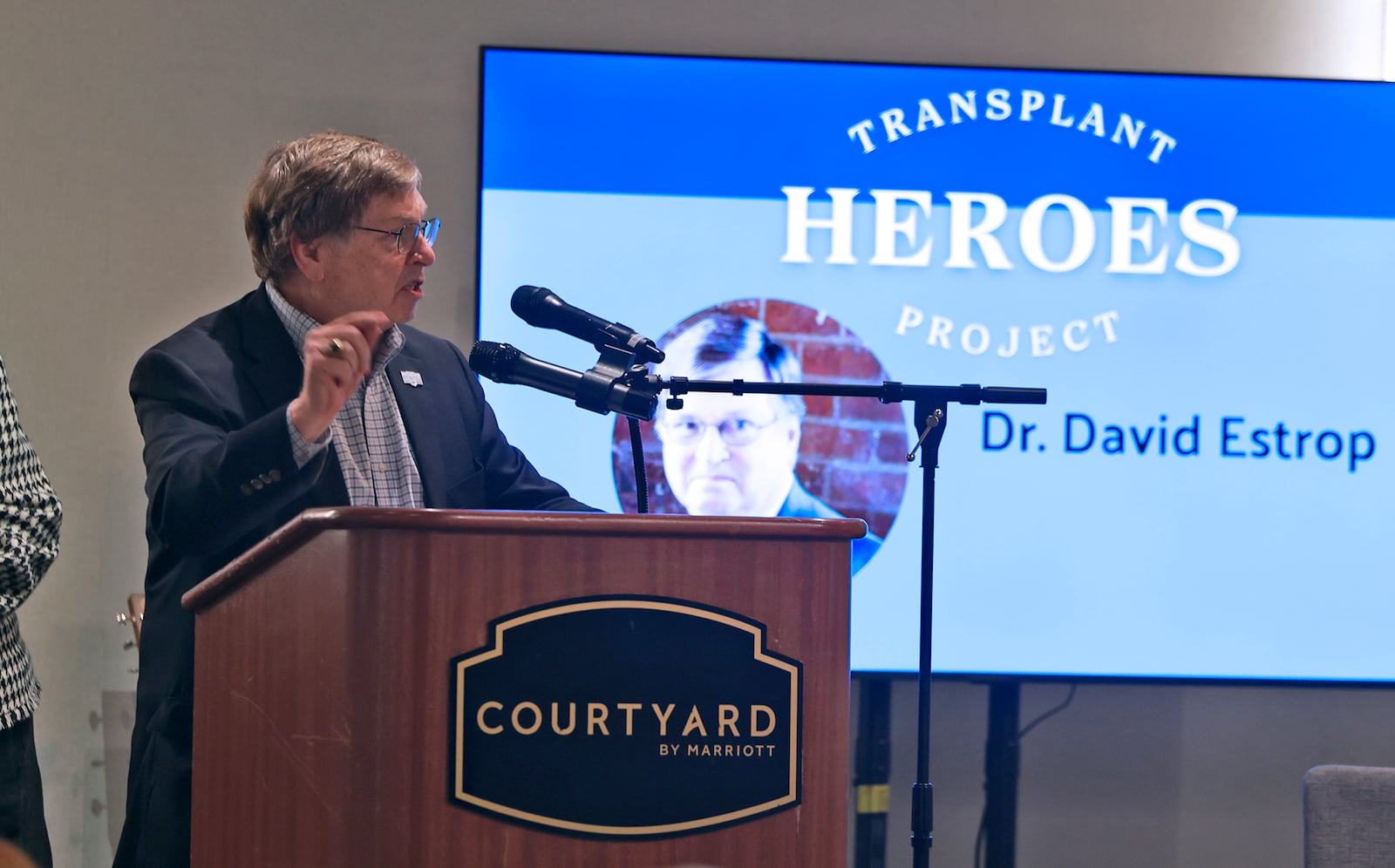 Dr. David Estrop speaks during the Mayor's Breakfast after being honored as a Transplant Hero Thursday, Nov. 21, 2024. BILL LACKEY/STAFF