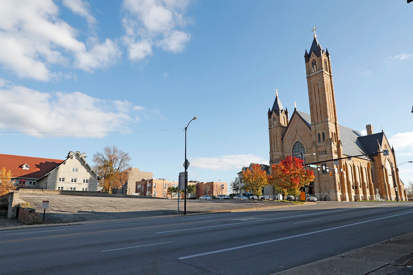 Today, the space is empty and used as overflow parking for St. Raphael’s Catholic Church. Bill Lackey/Staff