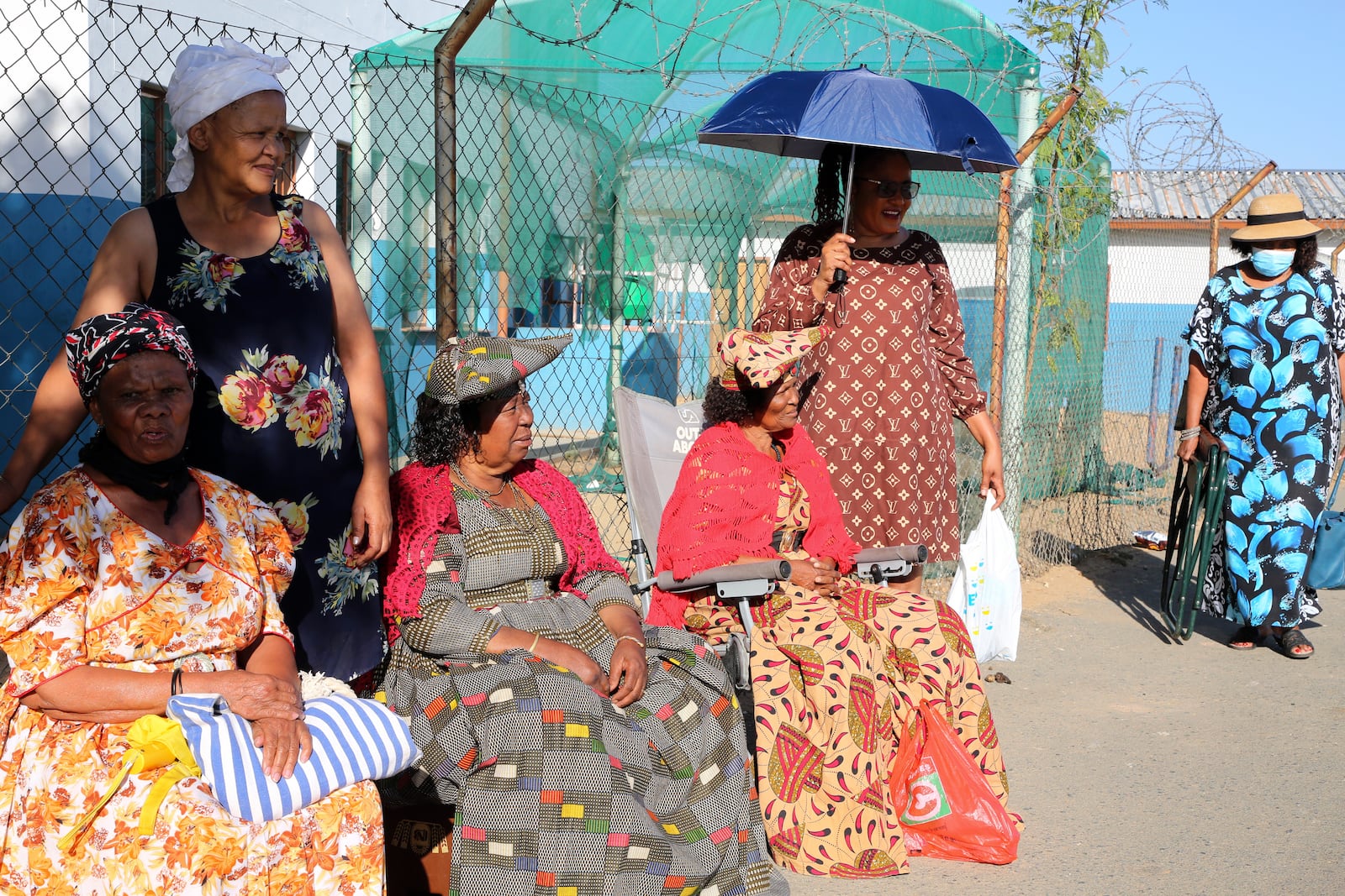 Namibians queue to cast their votes in a presidential election in Windhoek, Namibia Wednesday, Nov. 27, 2024. (AP Photo/Dirk Heinrich)