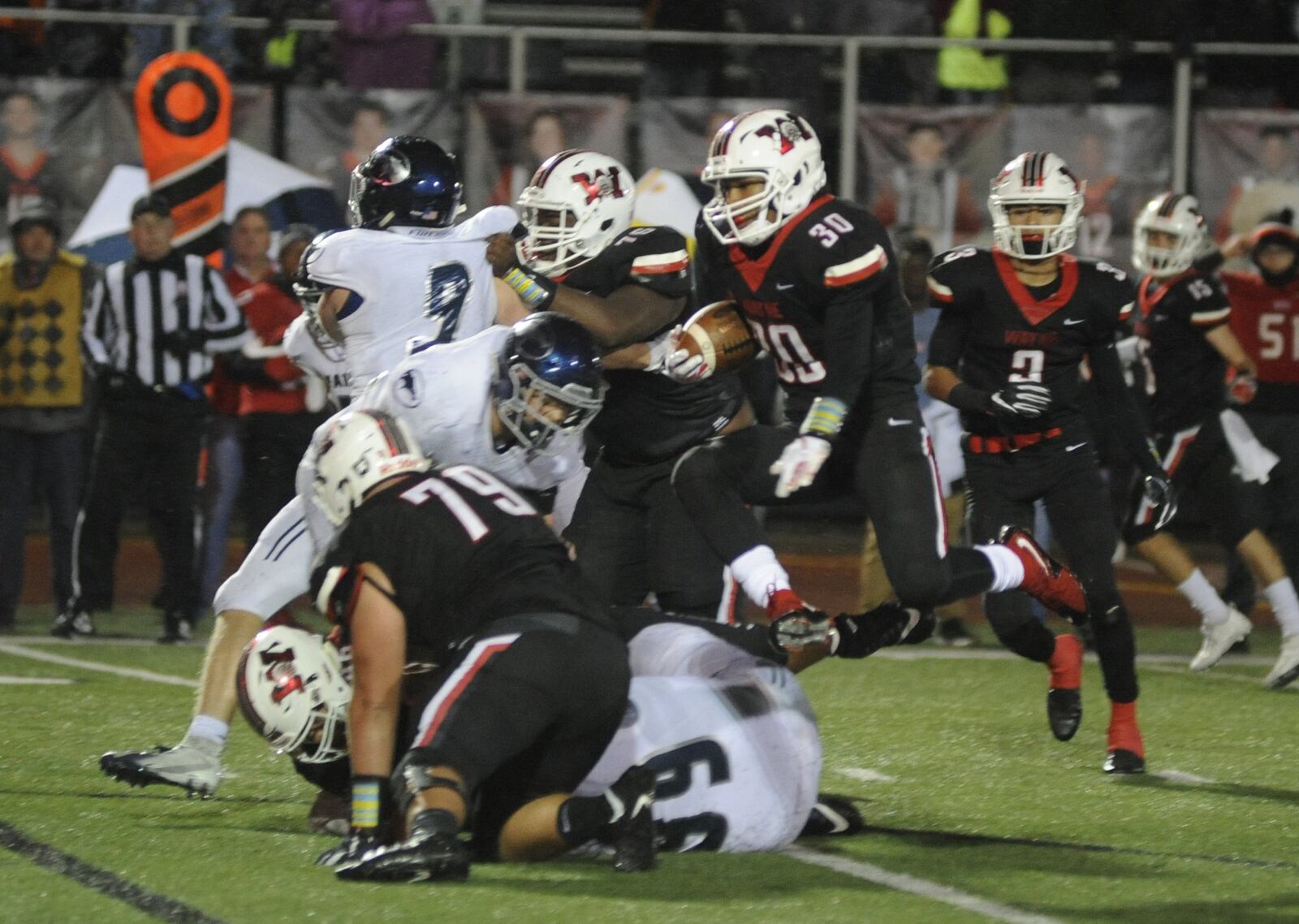 Wayne’s Devin Nelson (with ball) ran for five touchdowns. Wayne defeated visiting Fairmont 49-44 in a Week 8 high school football game on Friday, Oct. 12, 2018. MARC PENDLETON / STAFF