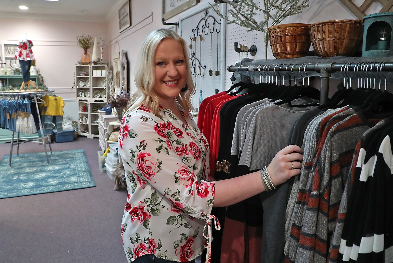 Kari Johnston has been busy getting her new boutique ready for its Nov. 5 opening. The Rose City Boutique is located at 115 East Ward St. and features products from several different local vendors.  BILL LACKEY/STAFF