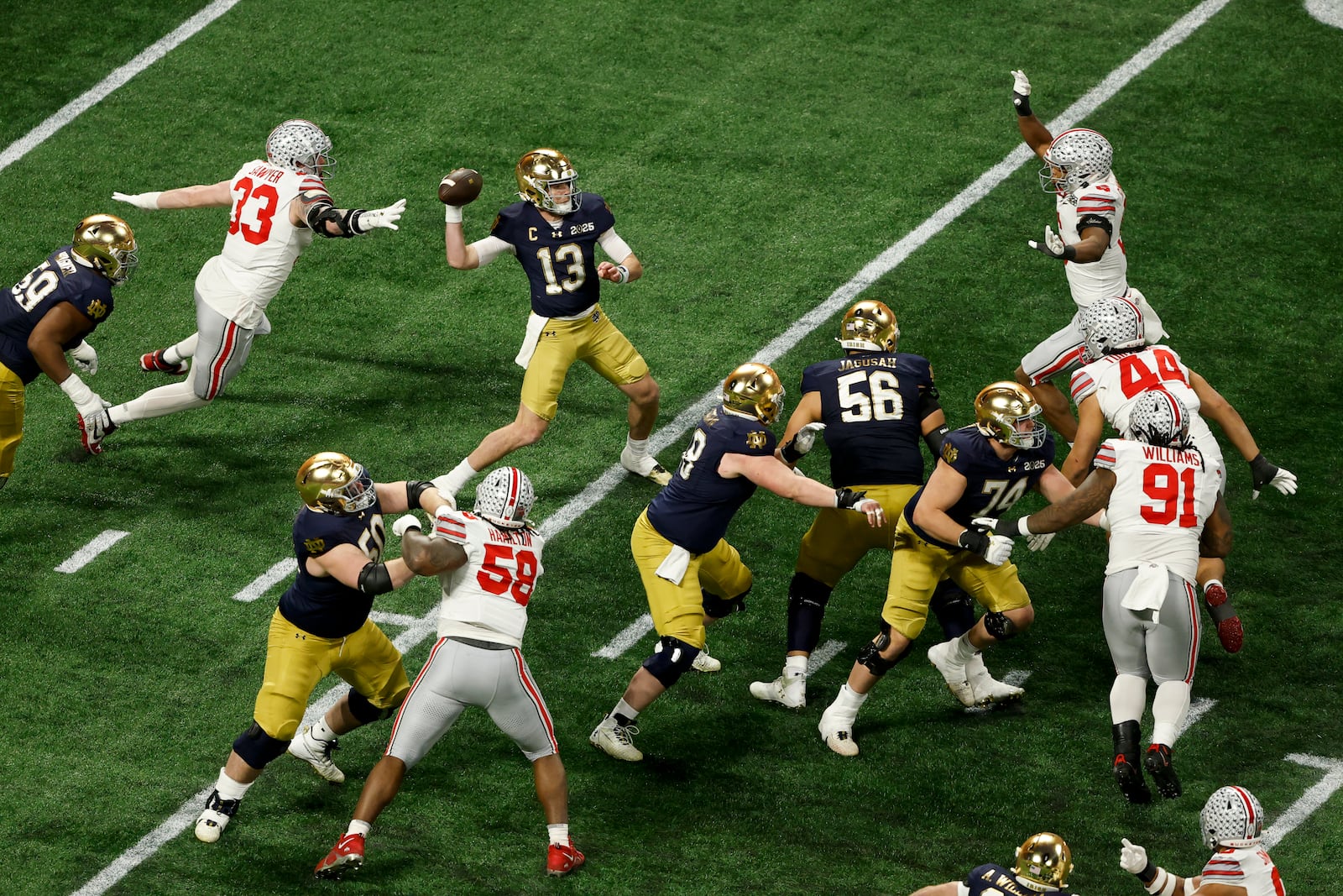 Notre Dame quarterback Riley Leonard passes against Ohio State during second half of the College Football Playoff national championship game Monday, Jan. 20, 2025, in Atlanta. (AP Photo/Butch Dill)