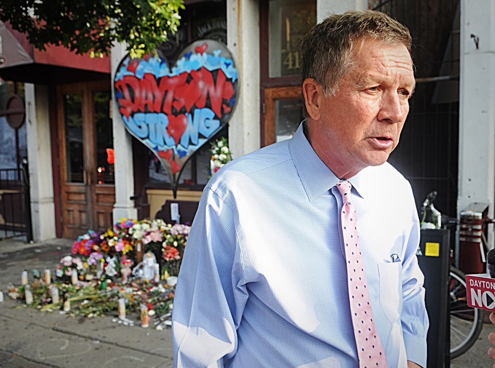 Former Ohio Gov. John Kasich visited the Oregon District shooting site Wednesday morning. Photo by Marshall Gorby.