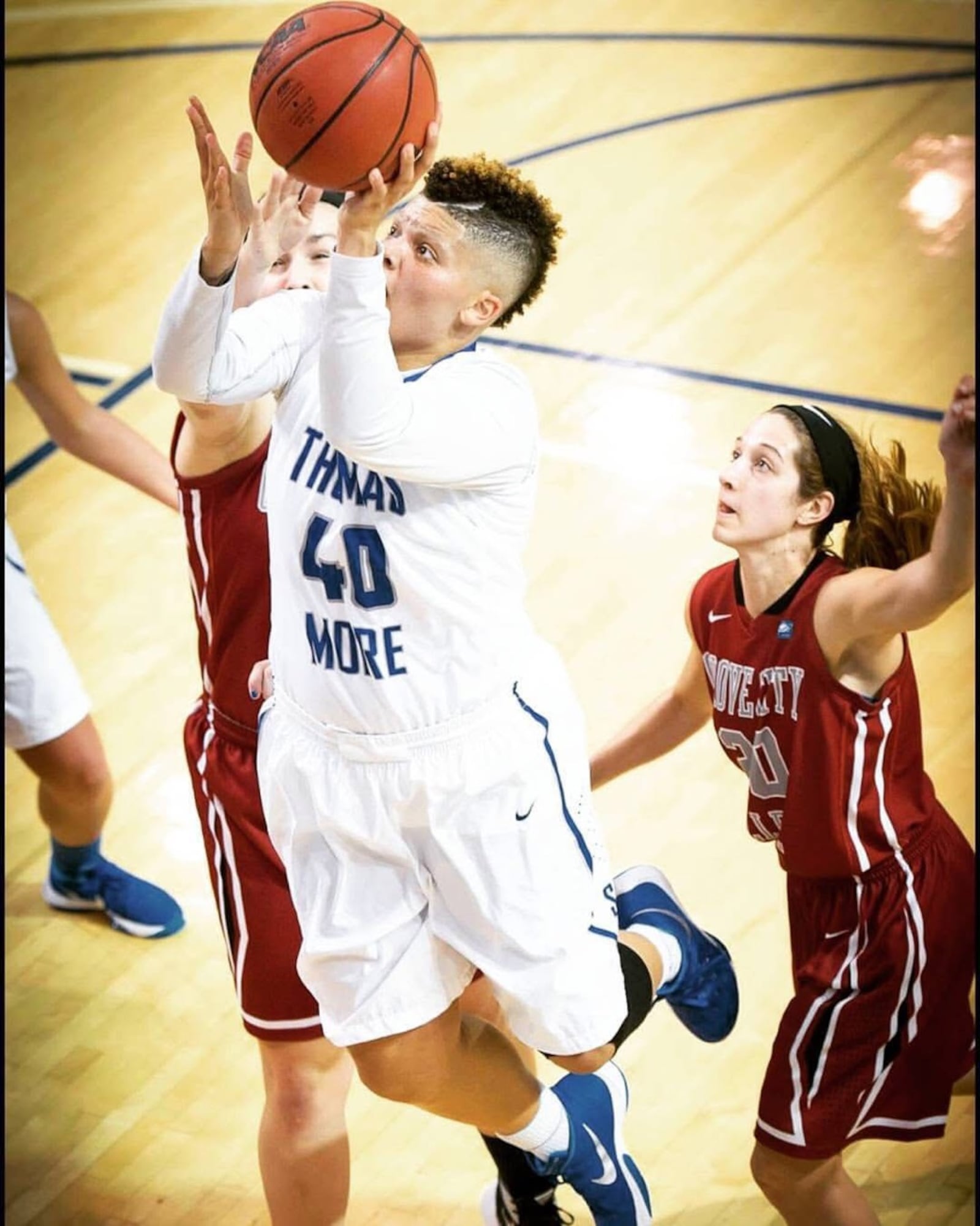 Thomas More’s Sydney Moss goes in for a layup. She played three seasons with the Saints and was named the Division III national player of the year each season. She’s in the school’s hall of fame and her No 40 jersey number has been retired.  (Contributed Photo)