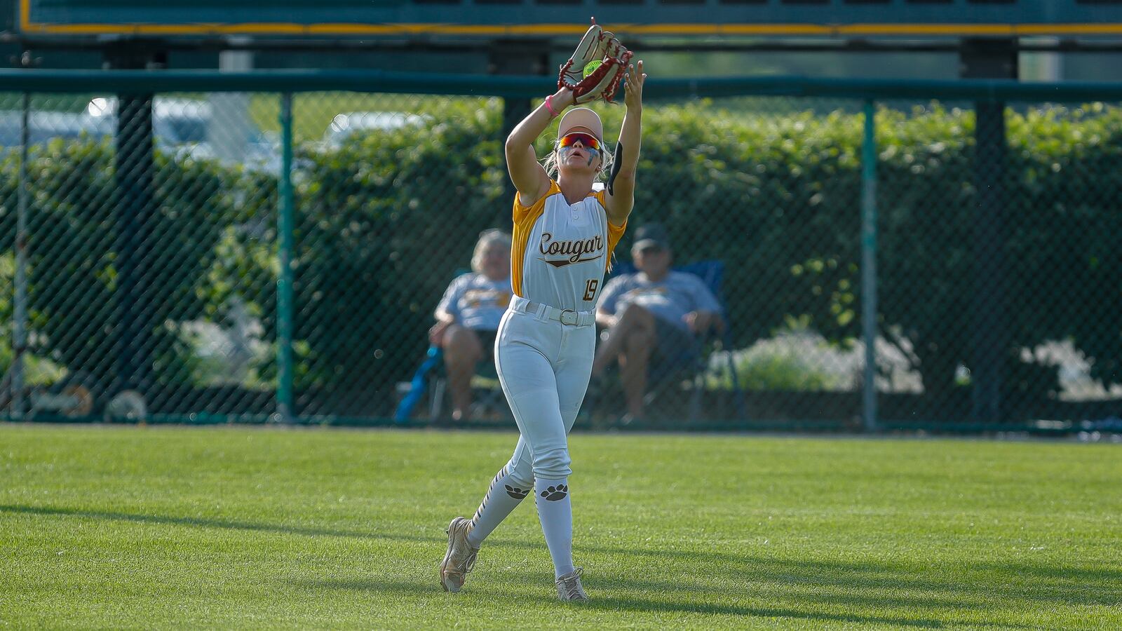 Kenton Ridge High School senior Dakotah Timmons catches a fly ball during their tournament game against Greenville earlier this season. Michael Cooper/CONTRIBUTED