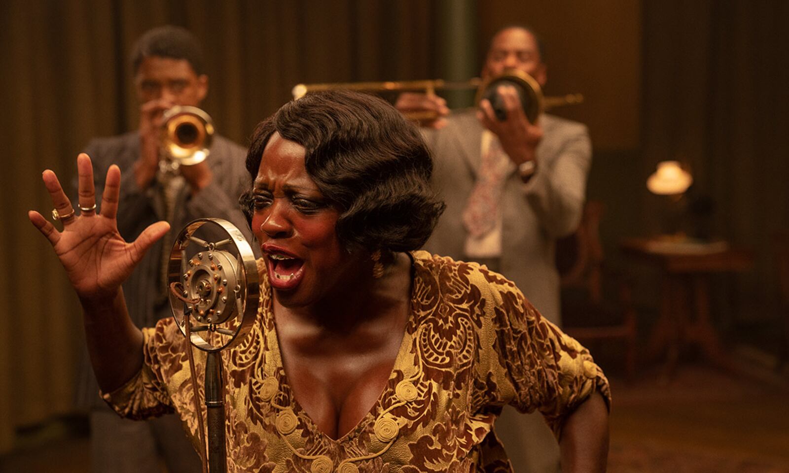 Chadwick Boseman as Levee, Viola Davis as Ma Rainey and Colman Domingo as Cutler in "Ma Rainey's Black Bottom." DAVID LEE/NETFLIX