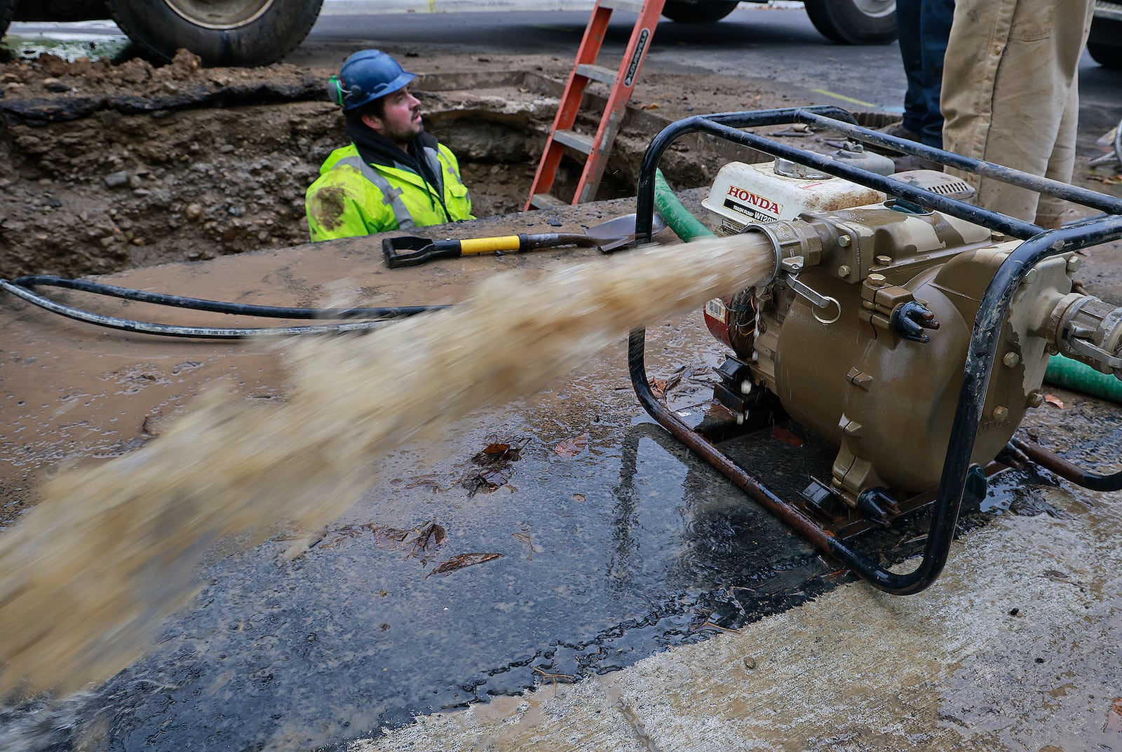 The City of Springfield Water Department spent the afternoon Wednesday, Dec. 4, 2024 repairing a water main break on East Northern Avenue. Over $100 million has been spent over the last five years to improve infrastructure for water/sewer/stormwater utilities, and as a result, city residents will see rate increases in both 2025 and 2026. BILL LACKEY/STAFF