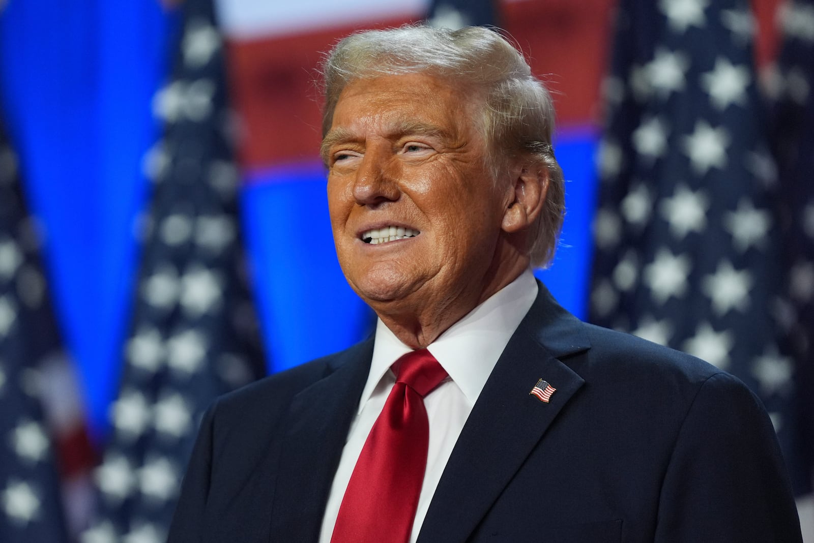 FILE - Republican presidential nominee former President Donald Trump smiles at an election night watch party at the Palm Beach Convention Center, Wednesday, Nov. 6, 2024, in West Palm Beach, Fla. (AP Photo/Evan Vucci, File)