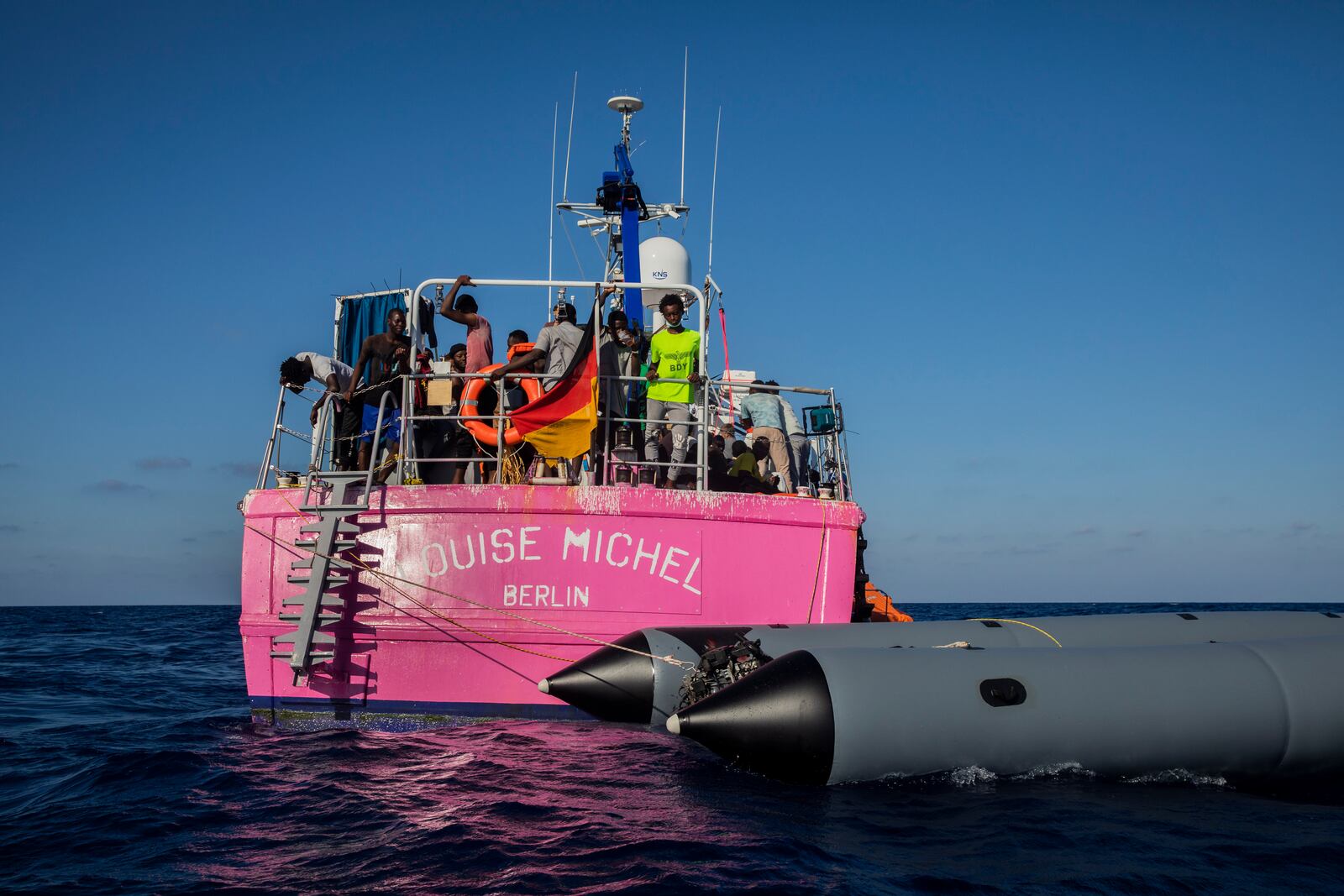 The Louise Michel rescue vessel with people rescued on board, after performing 2 rescue operations on the high seas in the past days, 70 miles south west Malta, Central Mediterranean sea, Saturday, Aug. 29, 2020. A rescue ship painted and sponsored by British artist Banksy saved another 130 migrants stranded on a rubber boat in the Southern Mediterranean Sea. (AP Photo/Santi Palacios)