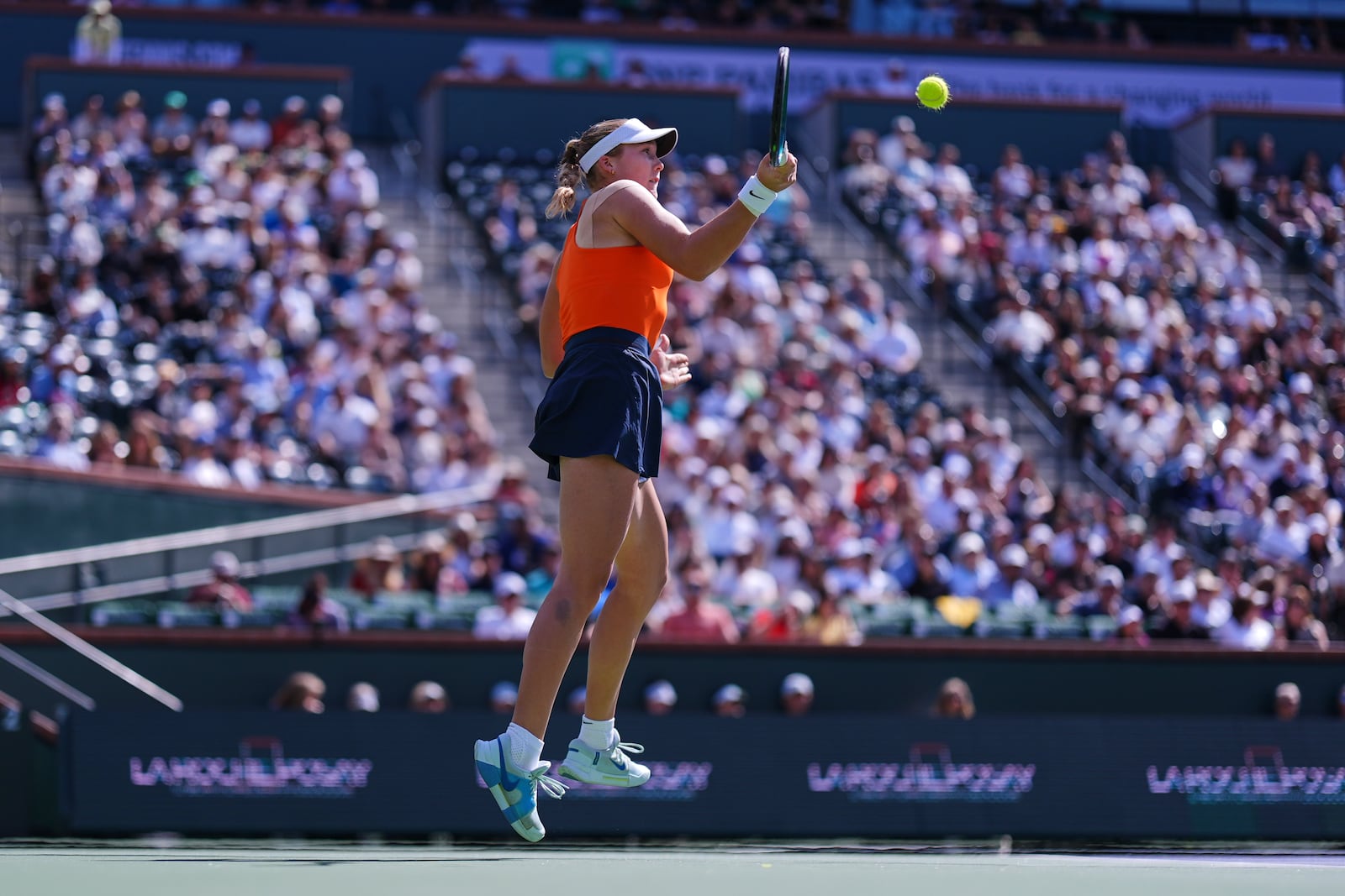 Mirra Andreeva, of Russia, returns to Aryna Sabalenka, of Belarus, during the final match at the BNP Paribas Open tennis tournament Sunday, March 16, 2025, in Indian Wells, Calif. (AP Photo/Mark J. Terrill)