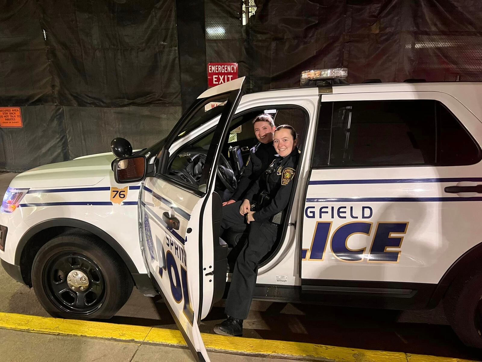 Annmeri Turner (front) and sister Antonia Turner are shown in a Springfield Police Division cruiser. The sisters followed in the footsteps of their father, Lou Turner, who retired as a lieutenant after more than 30 years with the department. The current photo was paired with a similar photo of the sisters in a cruiser from 20 years ago, creating a social media post going viral. CONTRIBUTED