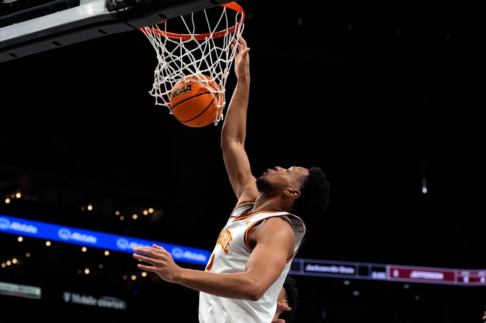 Iowa State's Joshua Jefferson (2) dunks during the second half of an NCAA college basketball game against Cincinnati in the second round of the Big 12 Conference tournament, Wednesday, March 12, 2025, in Kansas City, Mo. (AP Photo/Charlie Riedel)