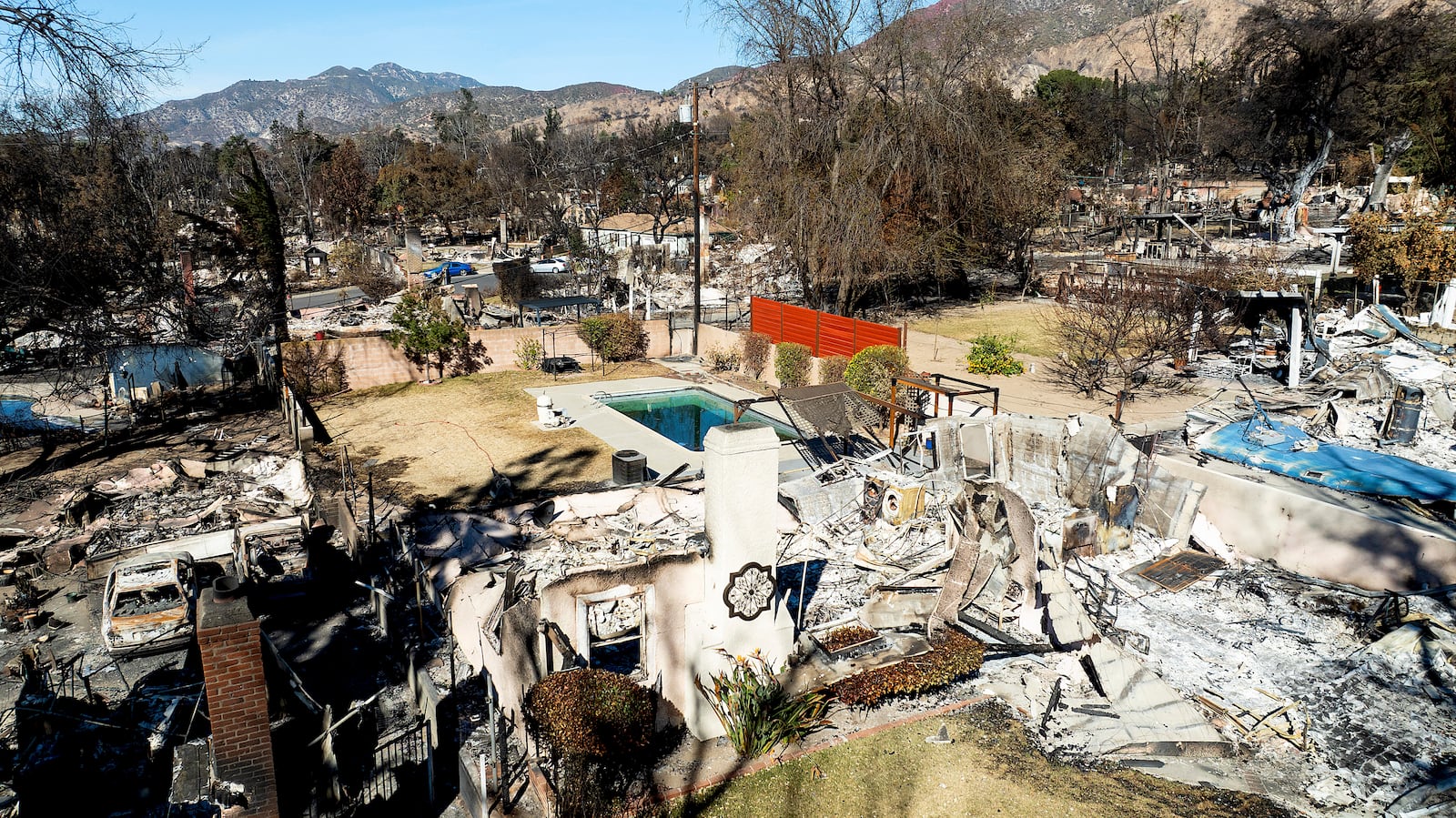 Residences destroyed by the Eaton Fire line a neighborhood in Altadena, Calif., on Tuesday, Jan. 21, 2025. (AP Photo/Noah Berger)