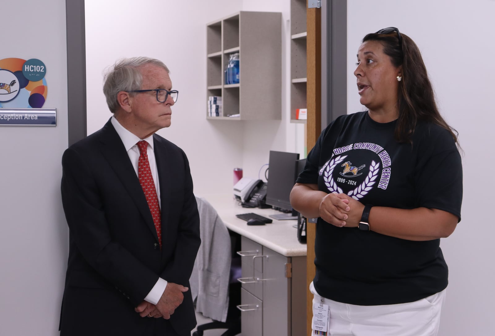 Rocking Horse COO Stacy Lee gives Ohio Gov. Mike DeWine a tour of Springfield High School's new School Based Health Center Monday, Aug. 12, 2024. JESSICA OROZCO/STAFF