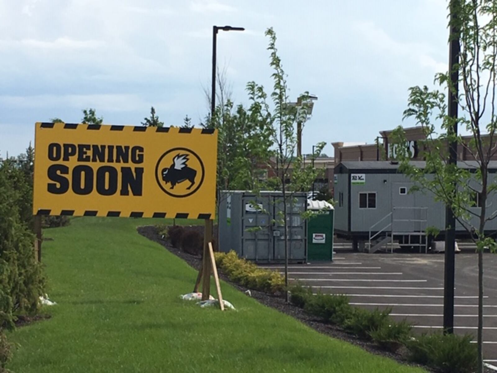 Work has started on the new Buffalo Wild Wings at Austin Landing. The projected opening, which includes the closing of the Springboro restaurant, is scheduled for September, according to company officials. NICK BLIZZARD/STAFF