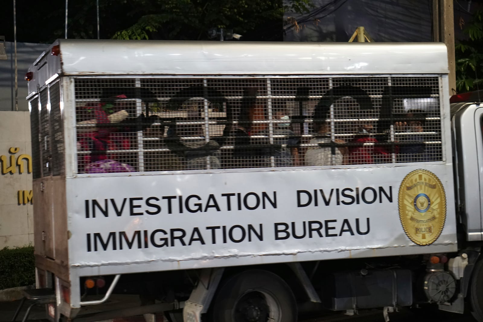 This photo provided by Thailand's daily web newspaper Prachatai shows a vehicle with a load of unidentified passengers leave the detention center in Bangkok, Thailand Thursday, Feb. 27, 2025.(Nuttaphol Meksobhon/Prachatai via AP)