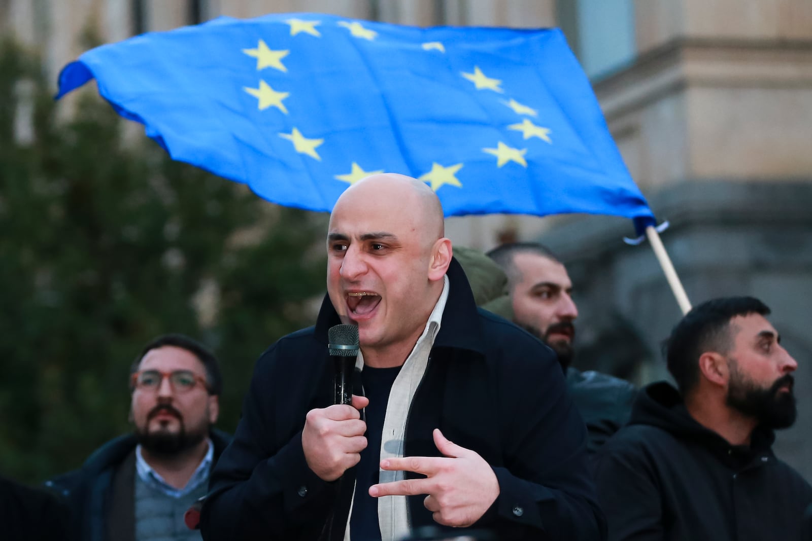 Leader of the Strong Georgia Coallition Nika Gvaramia speaks to a crowd during a rally against alleged violations in a recent parliamentary election in Tbilisi, Georgia, on Monday, Nov. 4, 2024. (AP Photo/Zurab Tsertsvadze)