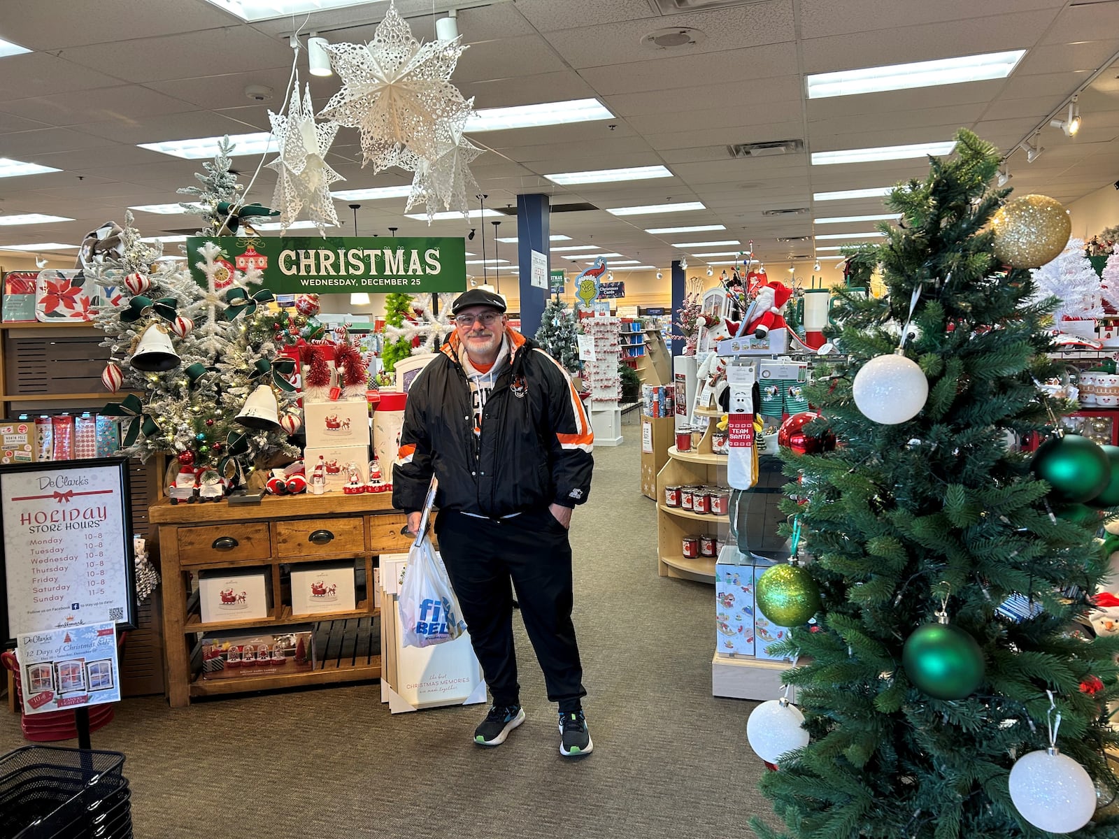 Mike Self, 62, of Kettering shops at DeClark's at the Town & Country Shopping Center for a Christmas present on Sunday, Dec. 22, 2024. LYNN HULSEY/STAFF