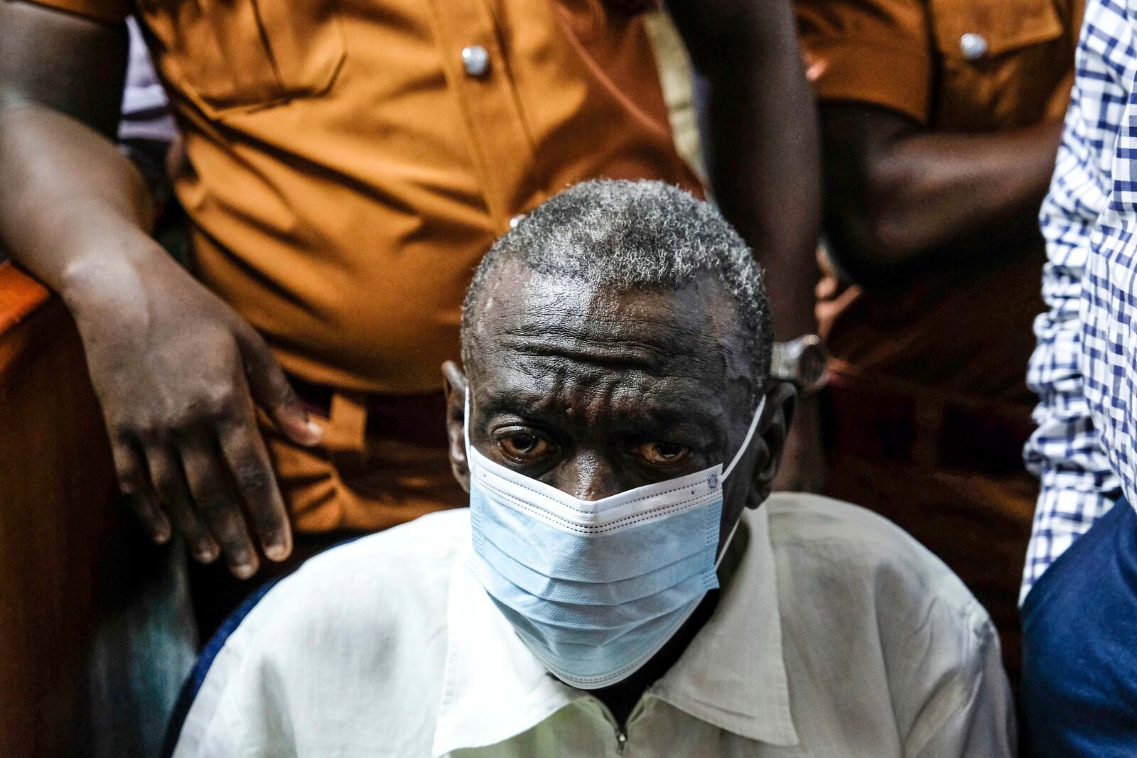 Ugandan opposition leader and four-time presidential candidate Kizza Besigye appears in a civilian court in Kampala, Uganda Wednesday, Feb. 19, 2025. (AP Photo/Hajarah Nalwadda)