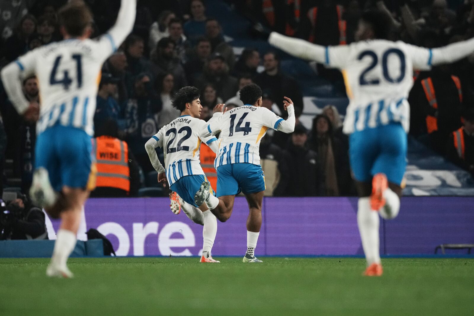 Brighton players celebrate after a goal during the English Premier League soccer match between Brighton and Chelsea in Brighton, England, Friday, Feb. 14, 2025. (AP Photo/Dave Shopland)