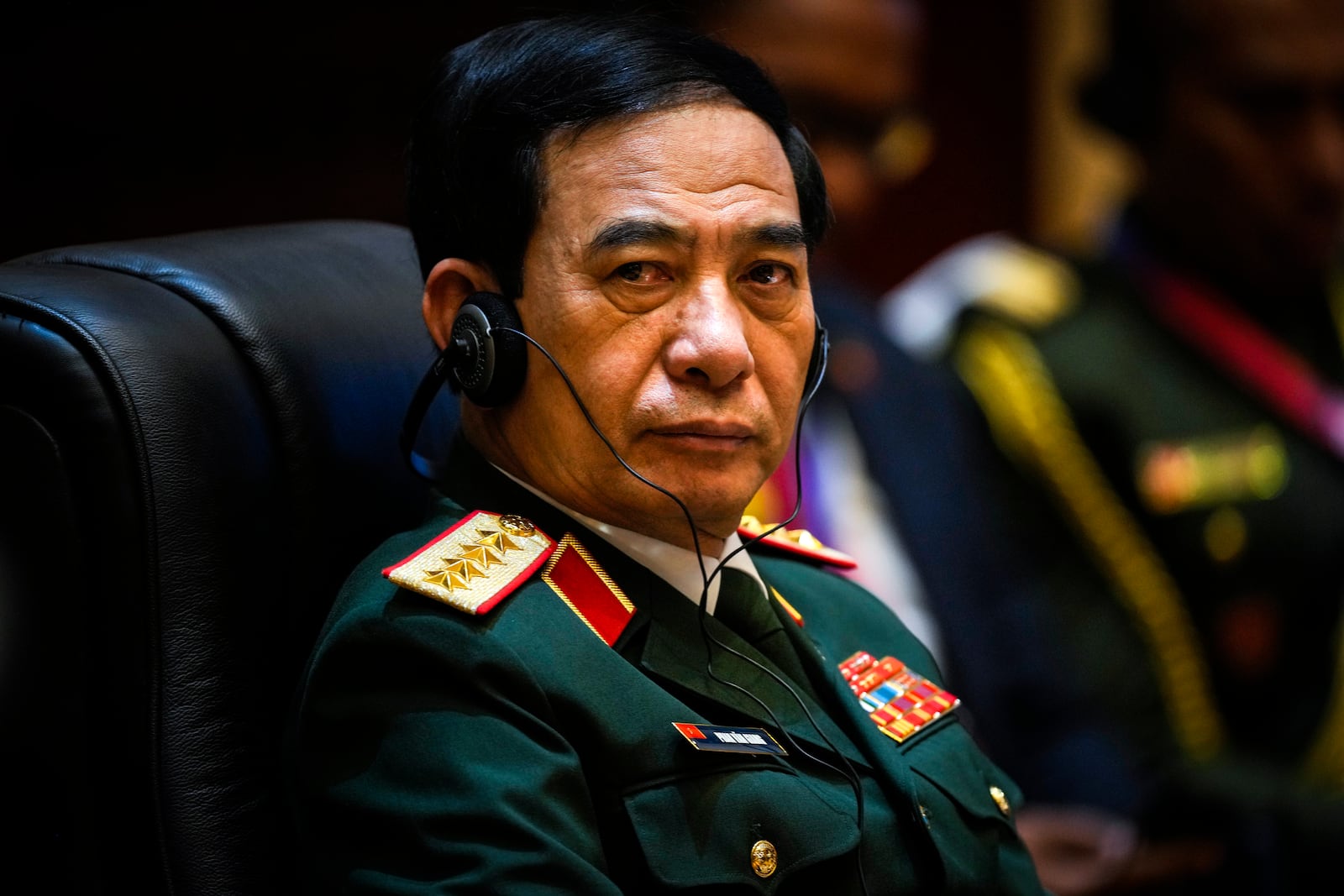 Vietnamese Defence Minister Phan Van Giang listens during the ASEAN Defence Ministers' informal Meeting in Vientiane, Laos, Wednesday, Nov. 20, 2024. (AP Photo/Anupam Nath)