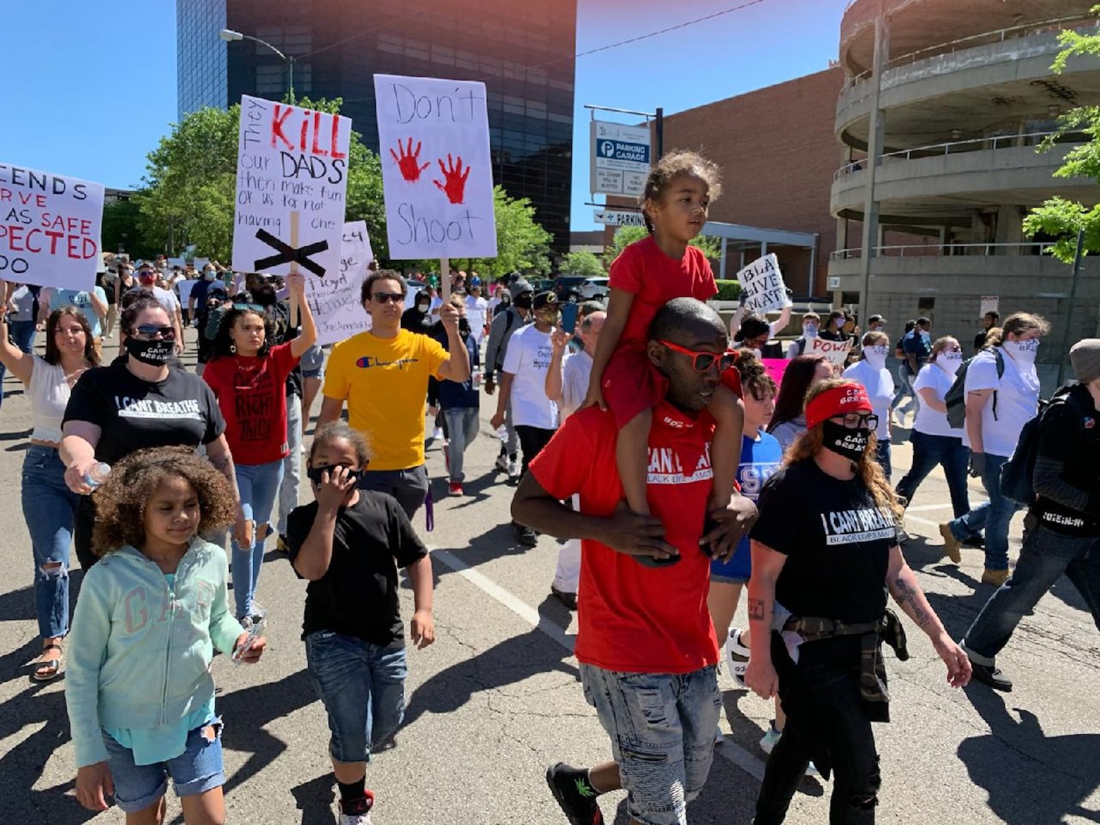 Hundreds gathered to march in protest in downtown Springfield on Sunday, May 31, 2020 following George Floyd's death earlier in the week. City officials in Springfield reactivated its police advisory team after Floyd's death. BILL LACKEY / STAFF