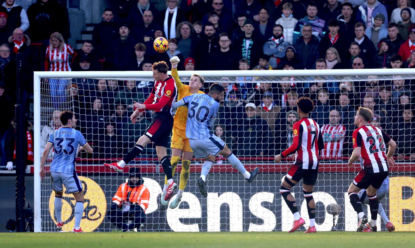 Tottenham Hotspur goalkeeper Antonin Kinsky punches the ball clear during the English Premier League soccer match between Brentford and Tottenham Hotspur at the Gtech Community Stadium, London, Sunday Feb. 2, 2025. (Steven Paston/PA via AP)