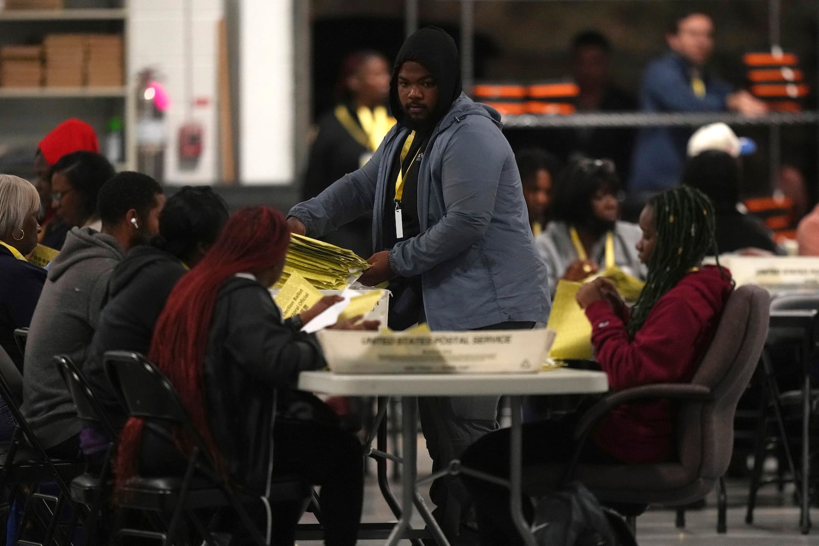 Election workers process mail-in ballots for the 2024 General Election in the United States at the Philadelphia Election Warehouse, early Monday, Nov. 6, 2024, in Philadelphia. (AP Photo/Matt Slocum)