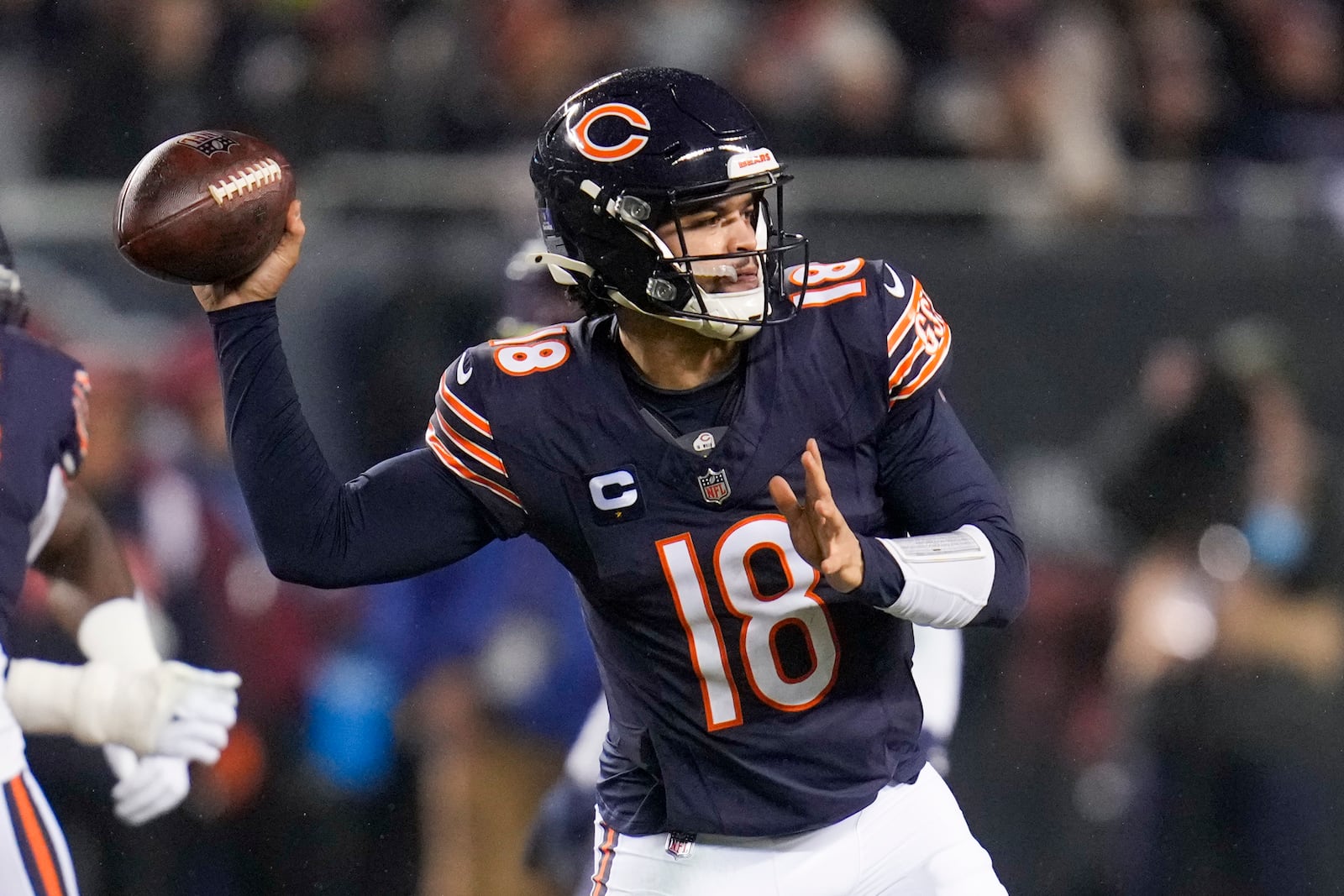 Chicago Bears quarterback Caleb Williams throws a pass against the Seattle Seahawks during the first half of an NFL football game, Thursday, Dec. 26, 2024, in Chicago. (AP Photo/Erin Hooley)