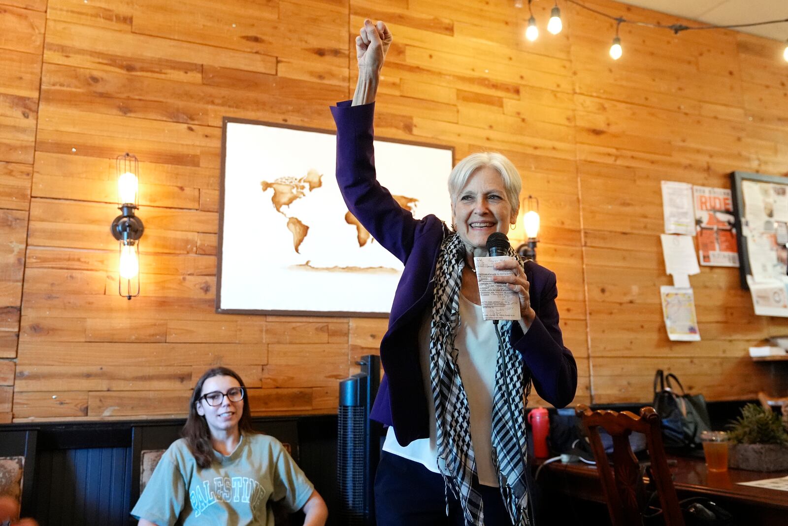 Green Party presidential candidate Jill Stein arrives to speak to supporters at a local coffee shop Monday, Oct. 28, 2024, in Phoenix. (AP Photo/Ross D. Franklin)