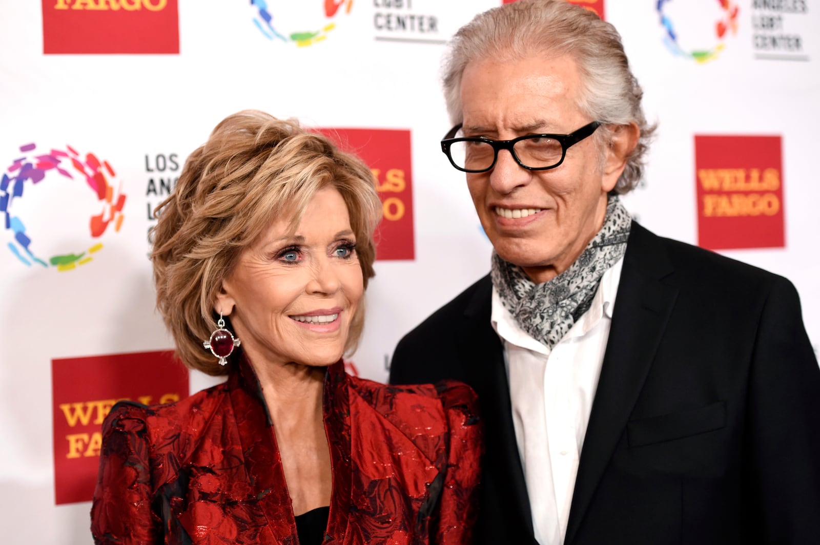 FILE - Jane Fonda, left, and Richard Perry pose for a photo at the Los Angeles LGBT Center's 46th Anniversary Gala Vanguard Awards at the Hyatt Regency Century Plaza in Los Angeles, Nov. 7, 2015. (Photo by Chris Pizzello/Invision/AP, File)