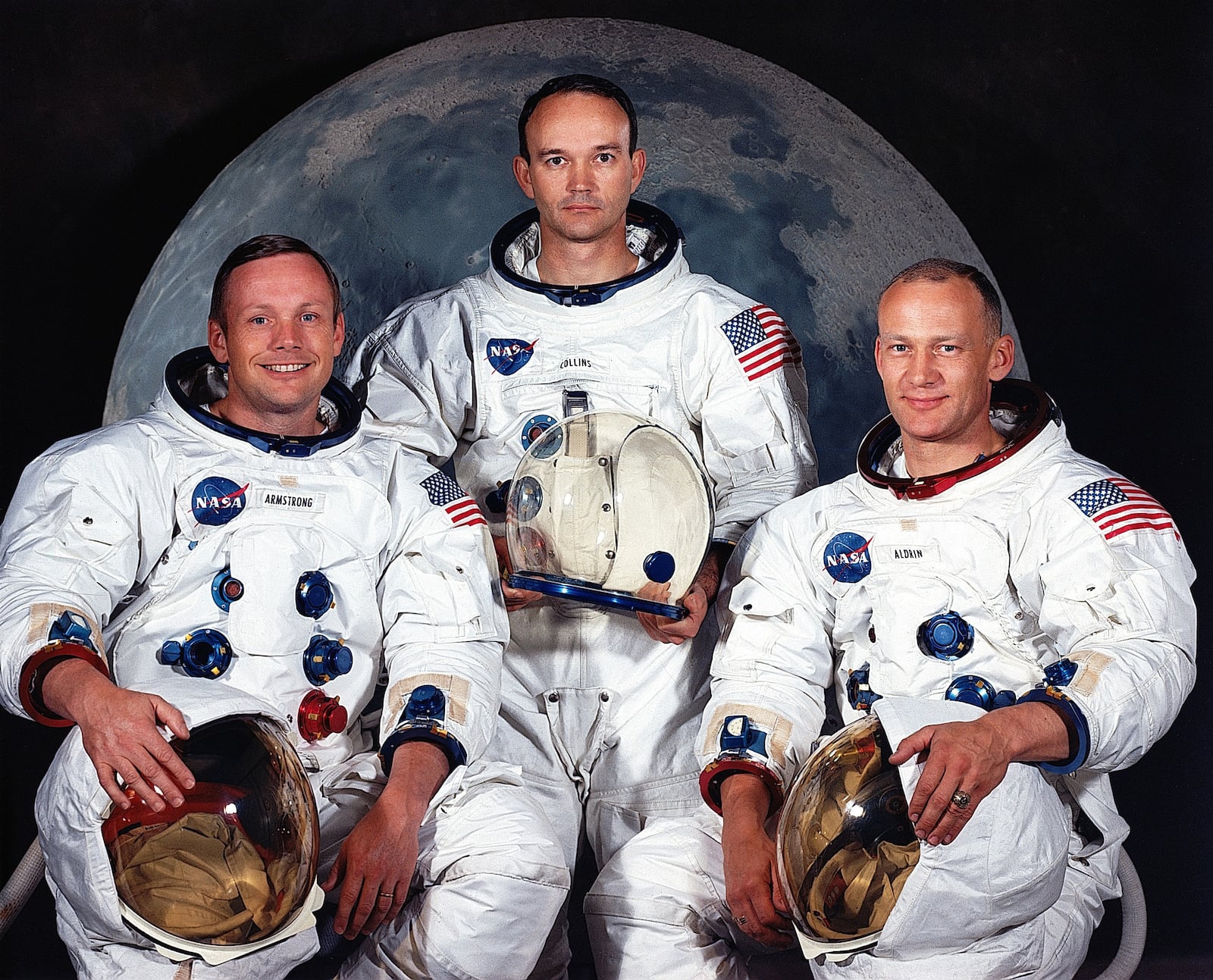 Apollo 11 Command Module Pilot and USAF Col. (later Maj. Gen.) Michael Collins (center) with Neil Armstrong (left) and USAF Col. Buzz Aldrin. NASA / MUSEUM OF THE UNITED STATES AIRFORCE